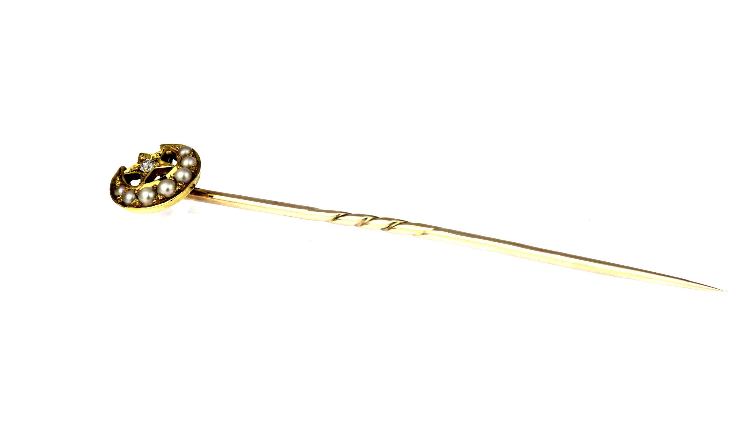 Antique, Victorian natural pearl and diamond Crescent Moon and Star tie pin set in 15-carat yellow gold. Circa 1880.
1 x Old cut diamond, approximate weight 0.02 carats
Pinhead width 8.2 mm x Length 8.1 mm
Length of pin 5.6 cm

Stick Pins have been