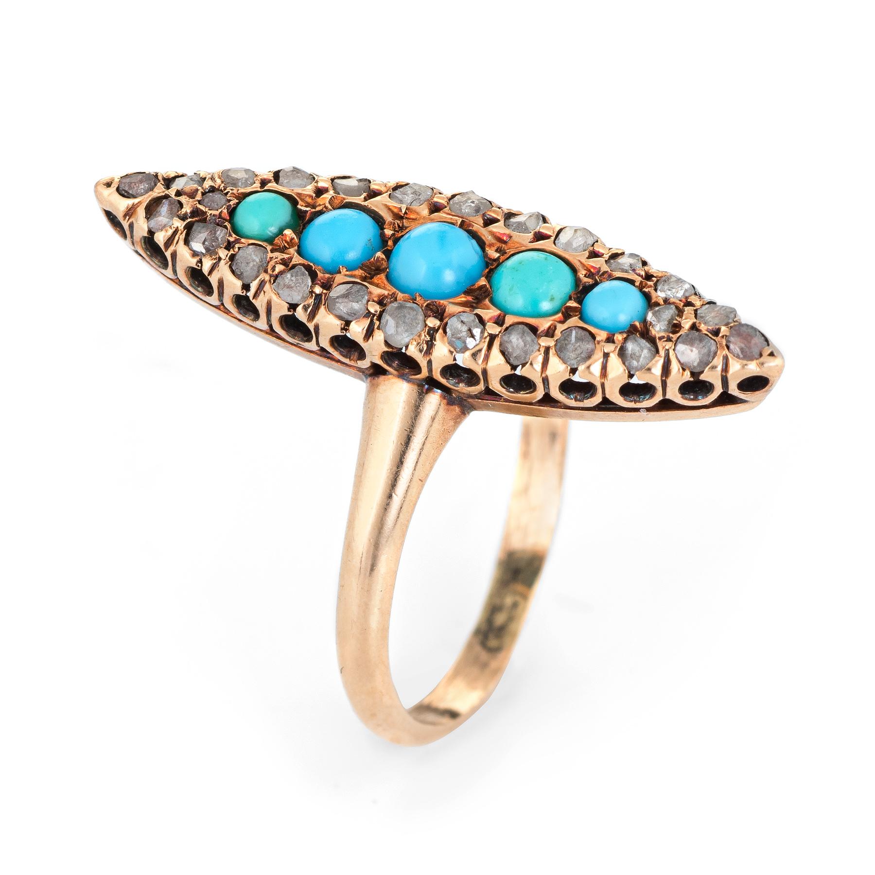 Finely detailed antique Victorian turquoise & diamond navette ring (circa 1880s to 1900s), crafted in 10 karat yellow gold. 

Centrally mounted Persian turquoise is cabochon cut and graduates in size from 2mm to 3mm. The 26 old rose cut diamonds