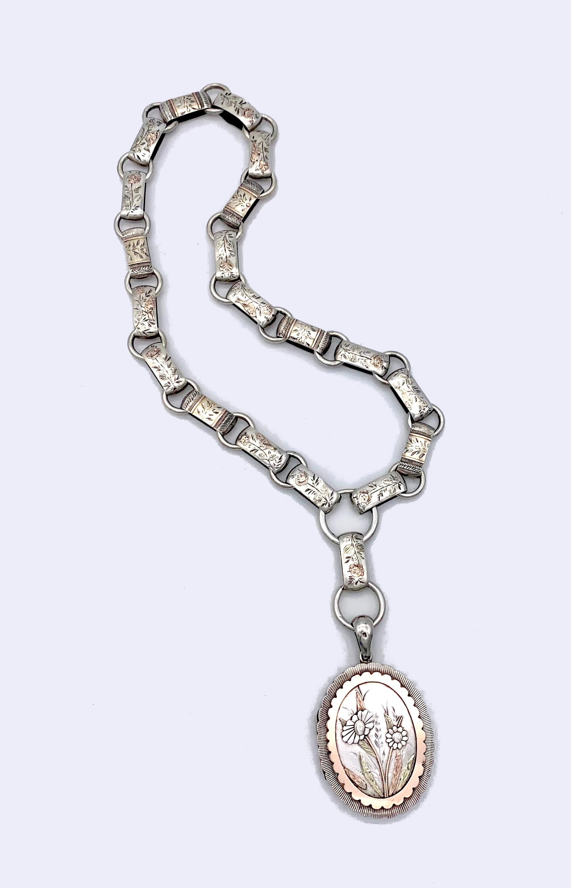 This Victorian necklace, a so called collar  comes with its original locket pendant. The locket was made by S. Blankensee and Son in Birmingham in 1890 or 1898, the letter is hard to decipher, out of sterling silver. The links of the collar features