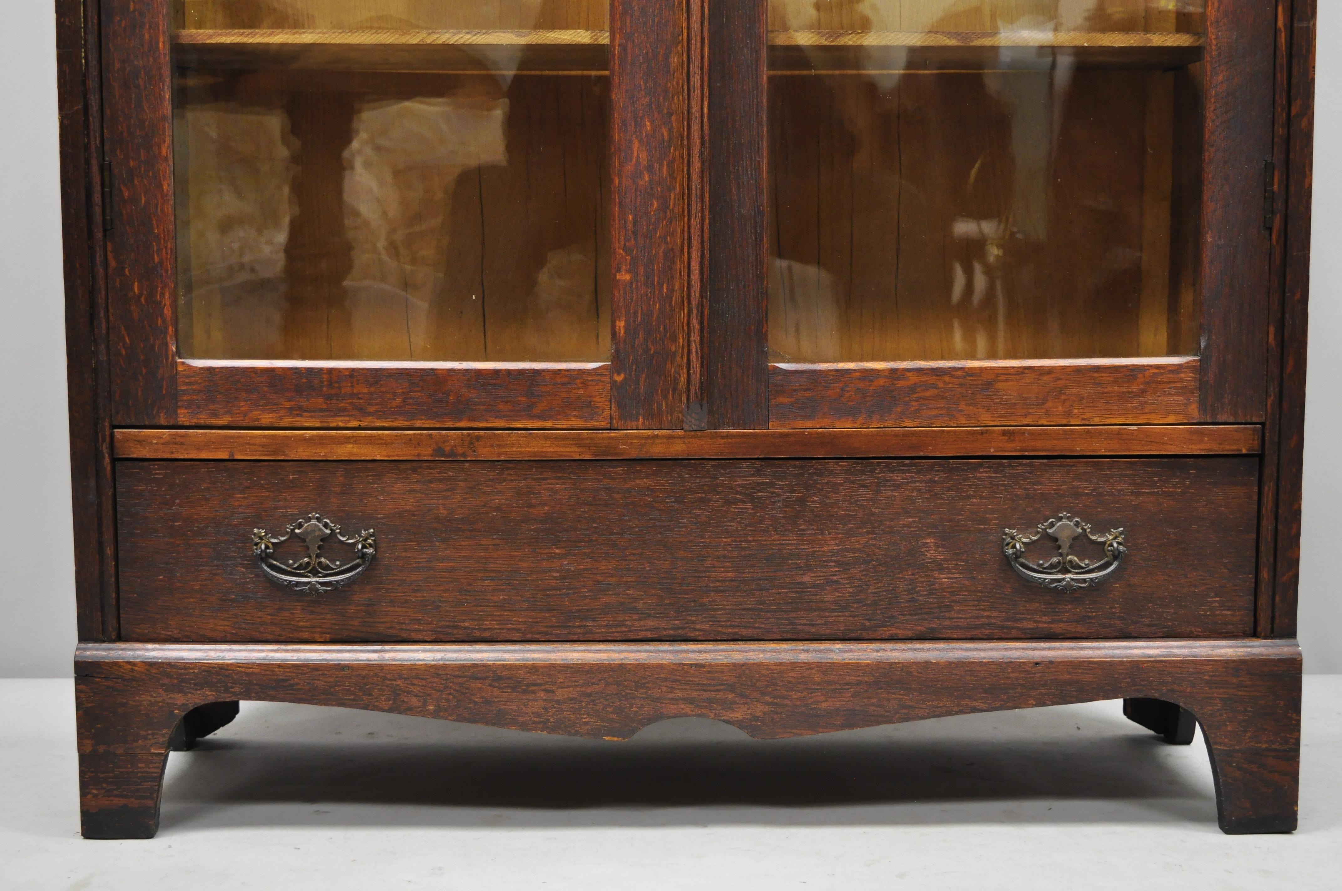 Antique Victorian Oak and Glass Northwind Face 2-Door Bookcase China Cabinet In Good Condition In Philadelphia, PA