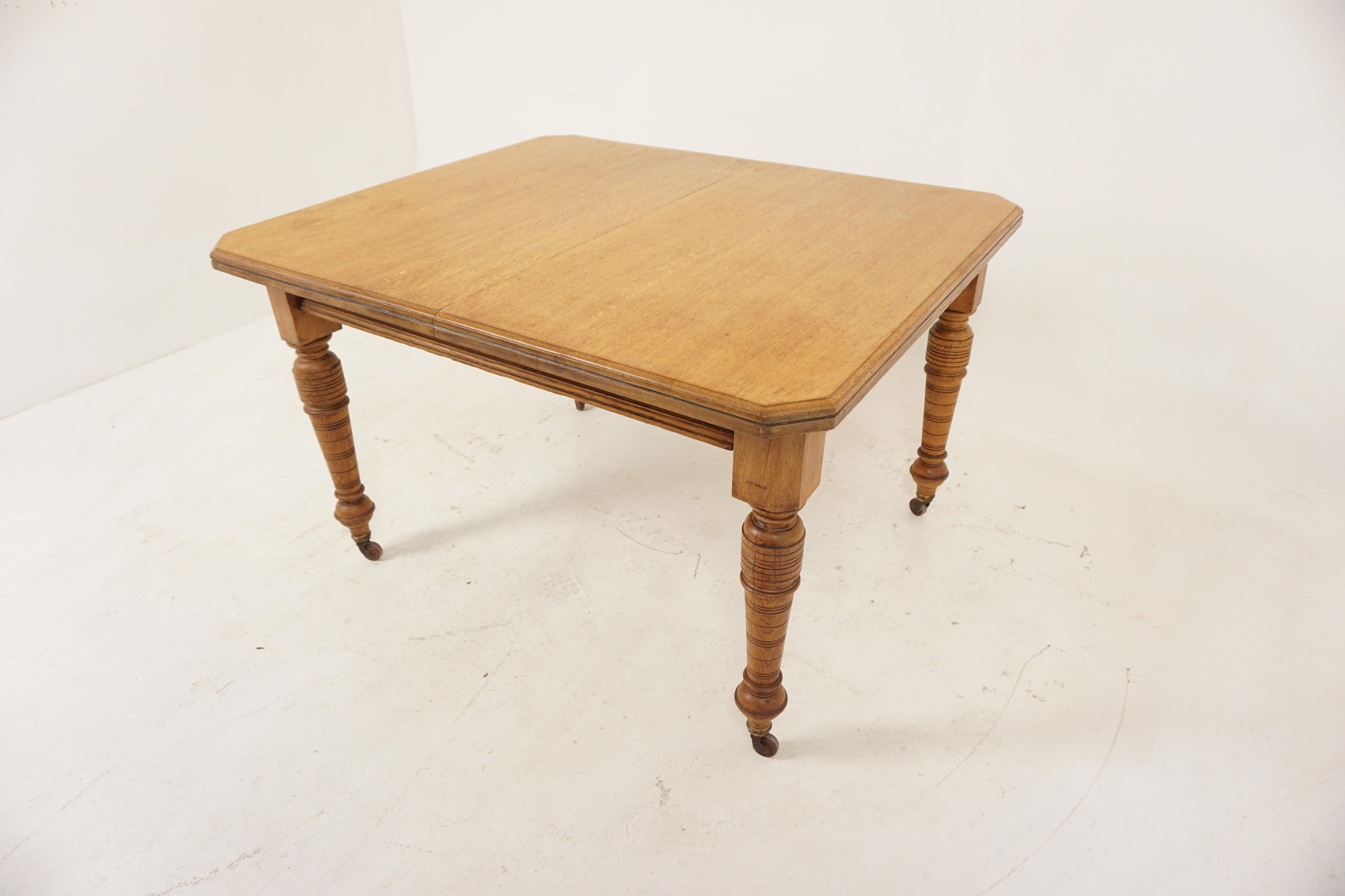Antique Victorian Oak Dining Table With 2 Leaves, Scotland 1880, B2587

Scotland 1880
Solid Oak
Original finish
Rectangular moulded top with canted ends
The table extends to accept 2 leaves 
All standing on 4 turned legs which end with