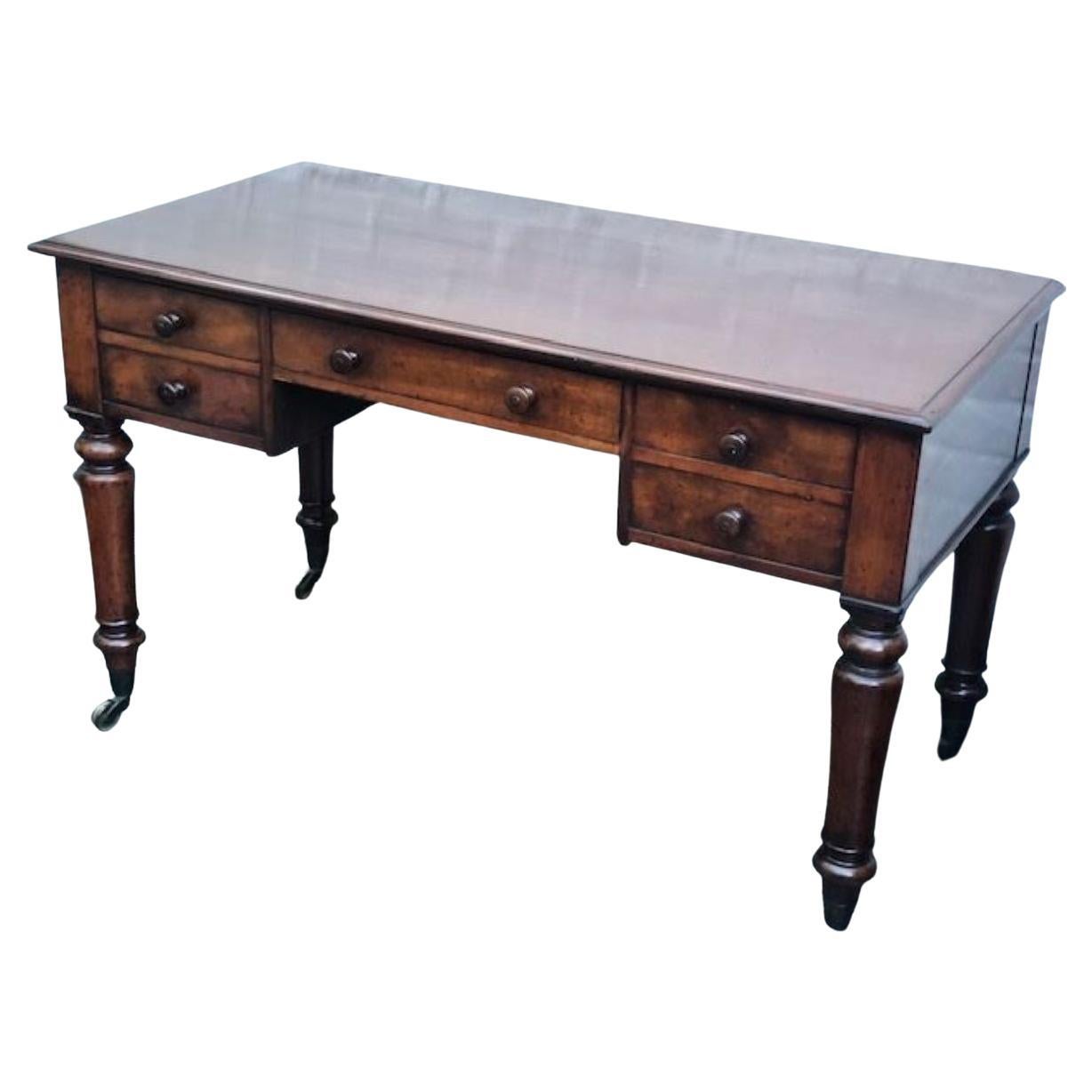 Antique Victorian oak & mahogany desk, writing table, English

Beautiful antique oak & mahogany Victorian desk, writing table. Made up of one large single central draw, and two dummy drawers either side, a flap drops down to reveal a spacious