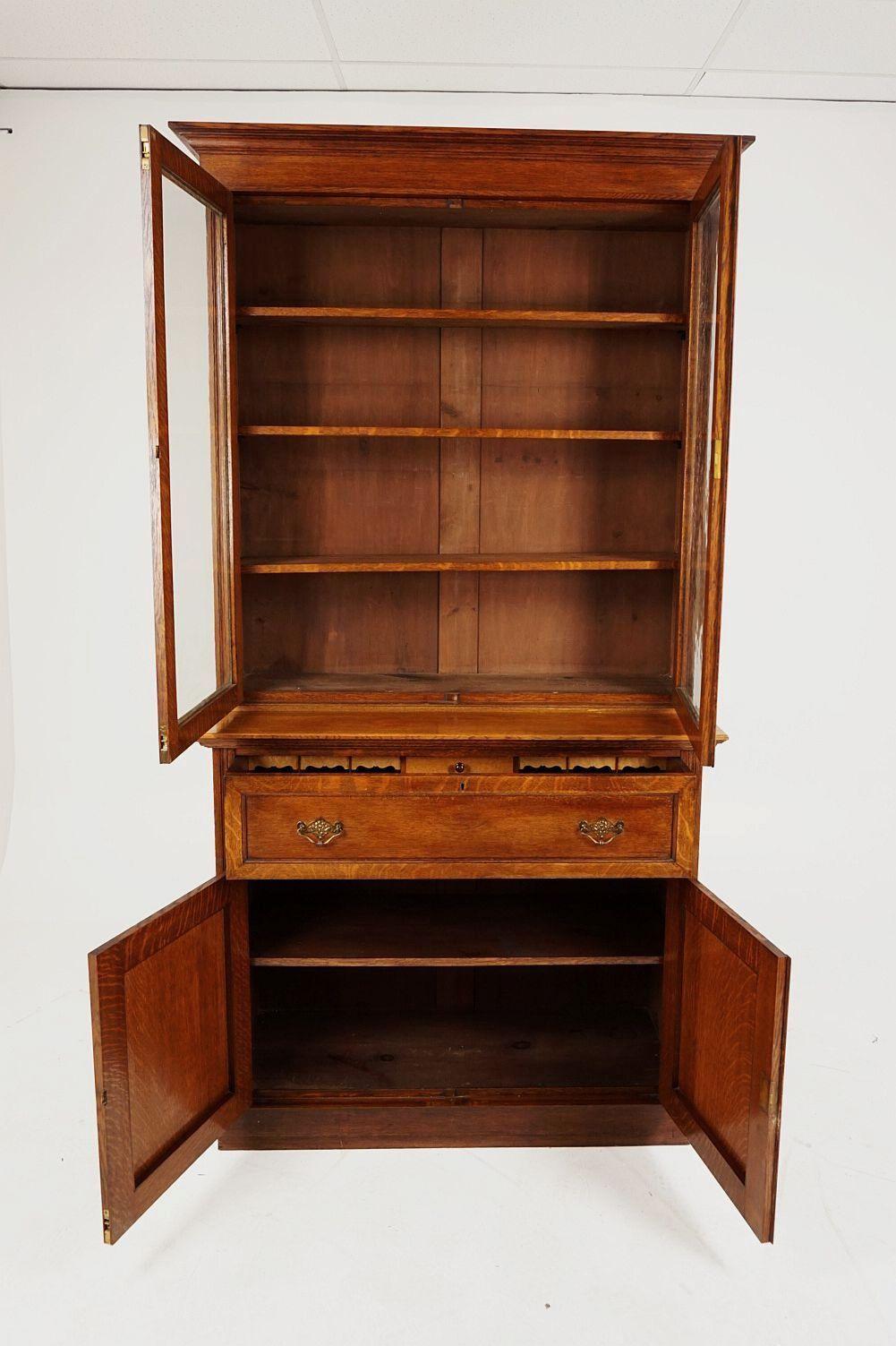 Antique Victorian oak secretaire bookcase, desk, bookcase, Scotland 1890, B1817

Scotland, 1890
Solid oak
Original finish
Moulded cornice above a pair of original glass doors
Enclosing three adjustable shelves
The secretaire drop front drawer