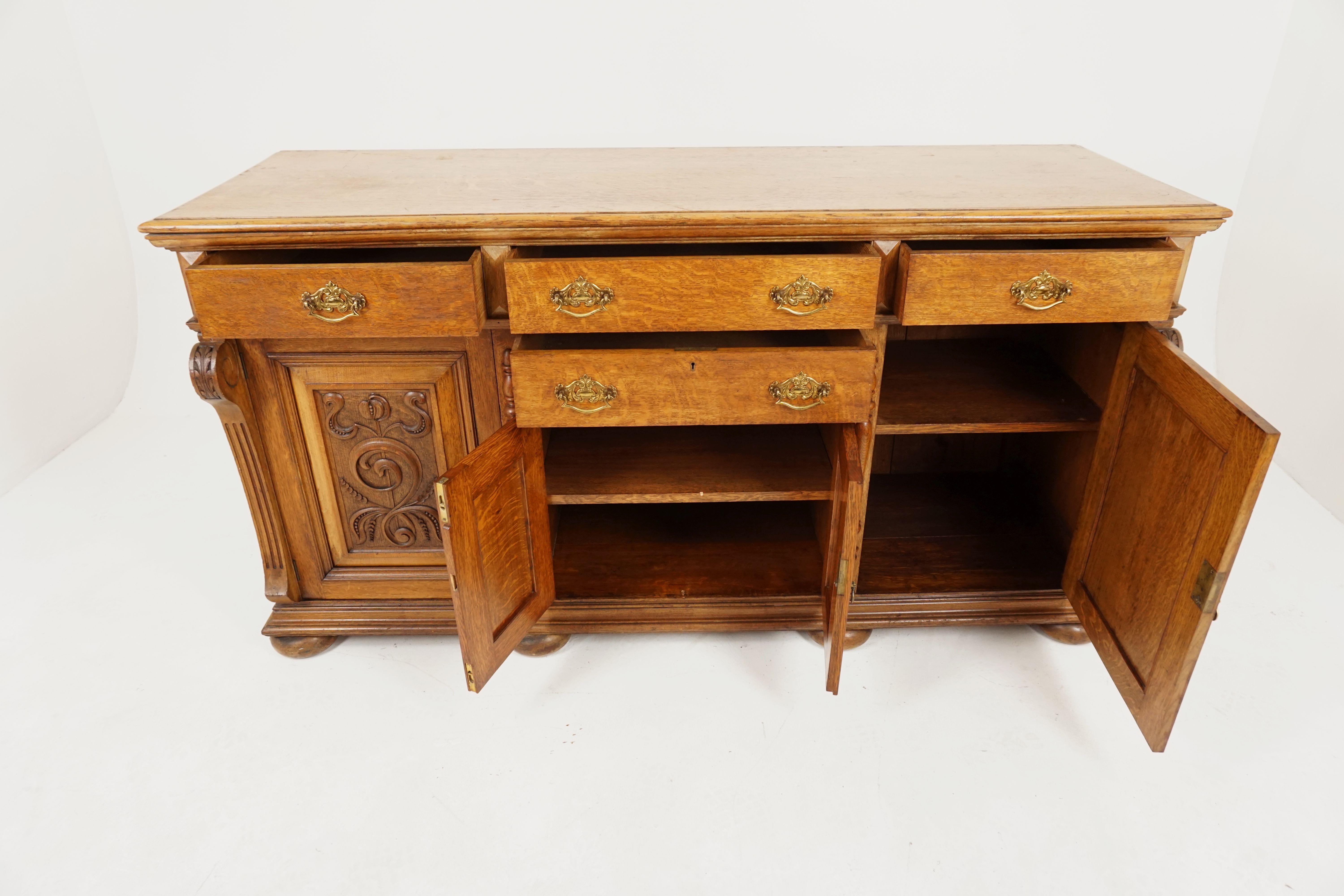 Antique Victorian oak sideboard, buffet, dresser, base,Scotland, 1890, B1815

Scotland 1890
Solid oak
Original finish
Rectangular top with moulded ledge
The center of the sideboard has two long carved drawers with a pair of carved cupboard