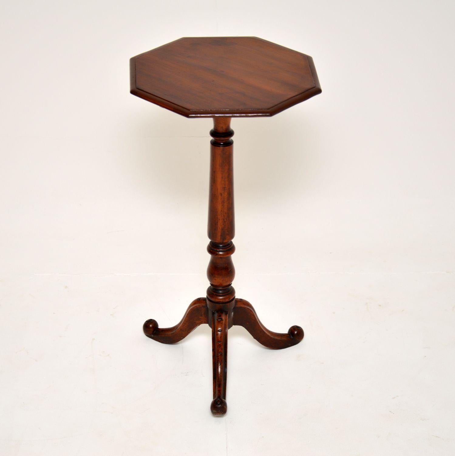 A wonderful original antique side table. This was made in England, it dates from around the 1840-1860 period.

It is of fantastic quality and has a lovely design. It is fairly tall, standing on a beautifully turned baluster column and tripod base,