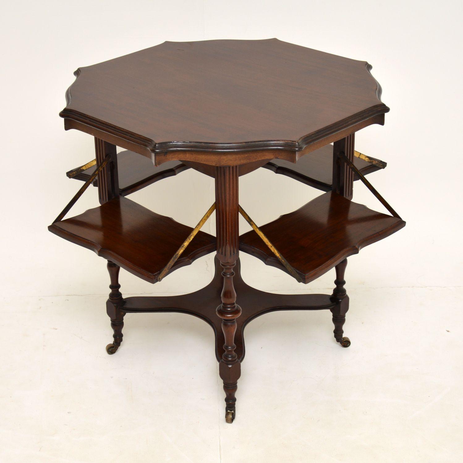 A smart and interesting antique occasional table. This dates from around the 1880-1890 period.

It is of lovely quality, with a beautifully shaped octagonal top. It sits on turned and fluted legs, which terminate in original brass casters.

This