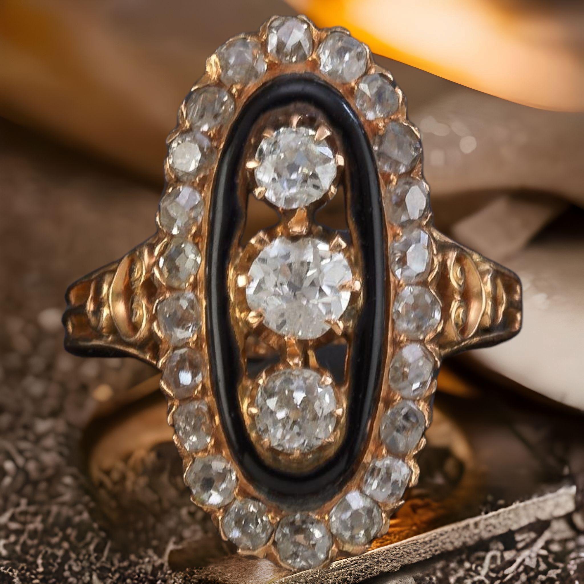 Navette shape is distinctive, sometimes referred as marquise shape. its proportions are pleasing to the eye and elongate the finger,
Centered vertically  within the Navette profile are three old  mine cut diamonds totaling approximately  1 carat