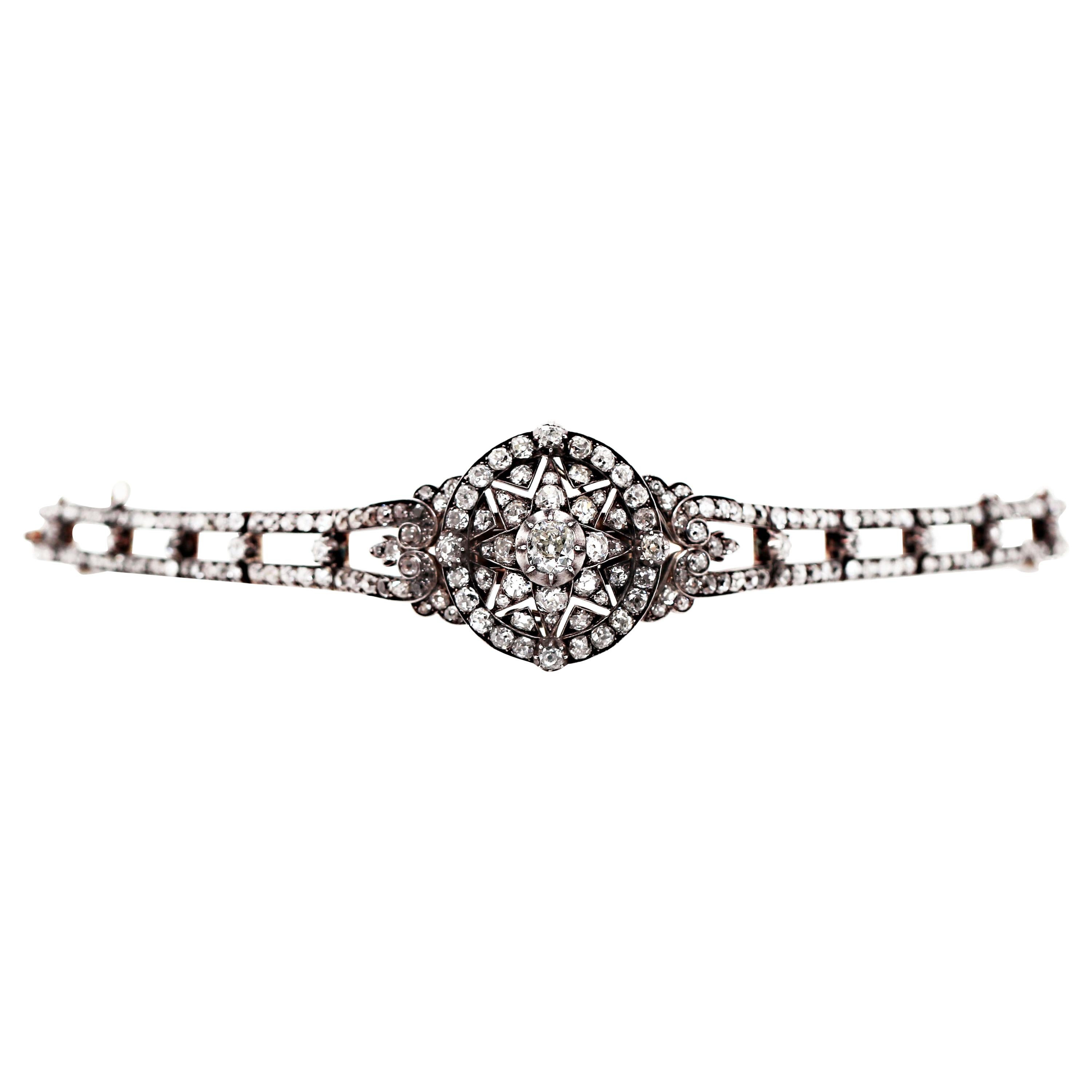 An exceptional piece handmade in the mid 1800's that can be worn as both a bracelet and pendant. This rare piece of jewellery is in immaculate condition for its age, featuring an impressive total of 125 old cut diamonds all mounted in silver on