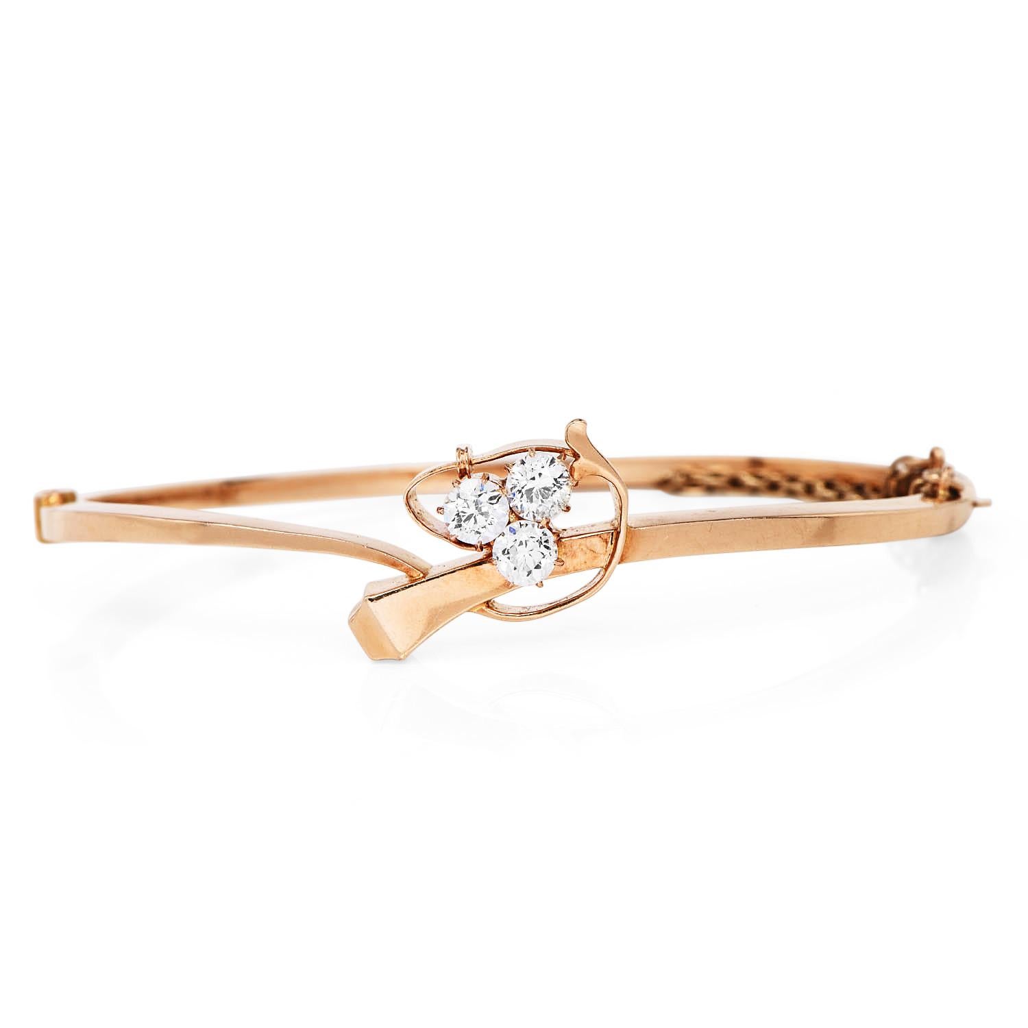 
This Antique Victorian bangle bracelet is Crafted in solid 14K rose gold; this beauty is centered with (3)natural genuine old European-cut diamond weighing approx 1.00 carats in total, H-I color, VS clarity prong-set

This Antique gold bangle