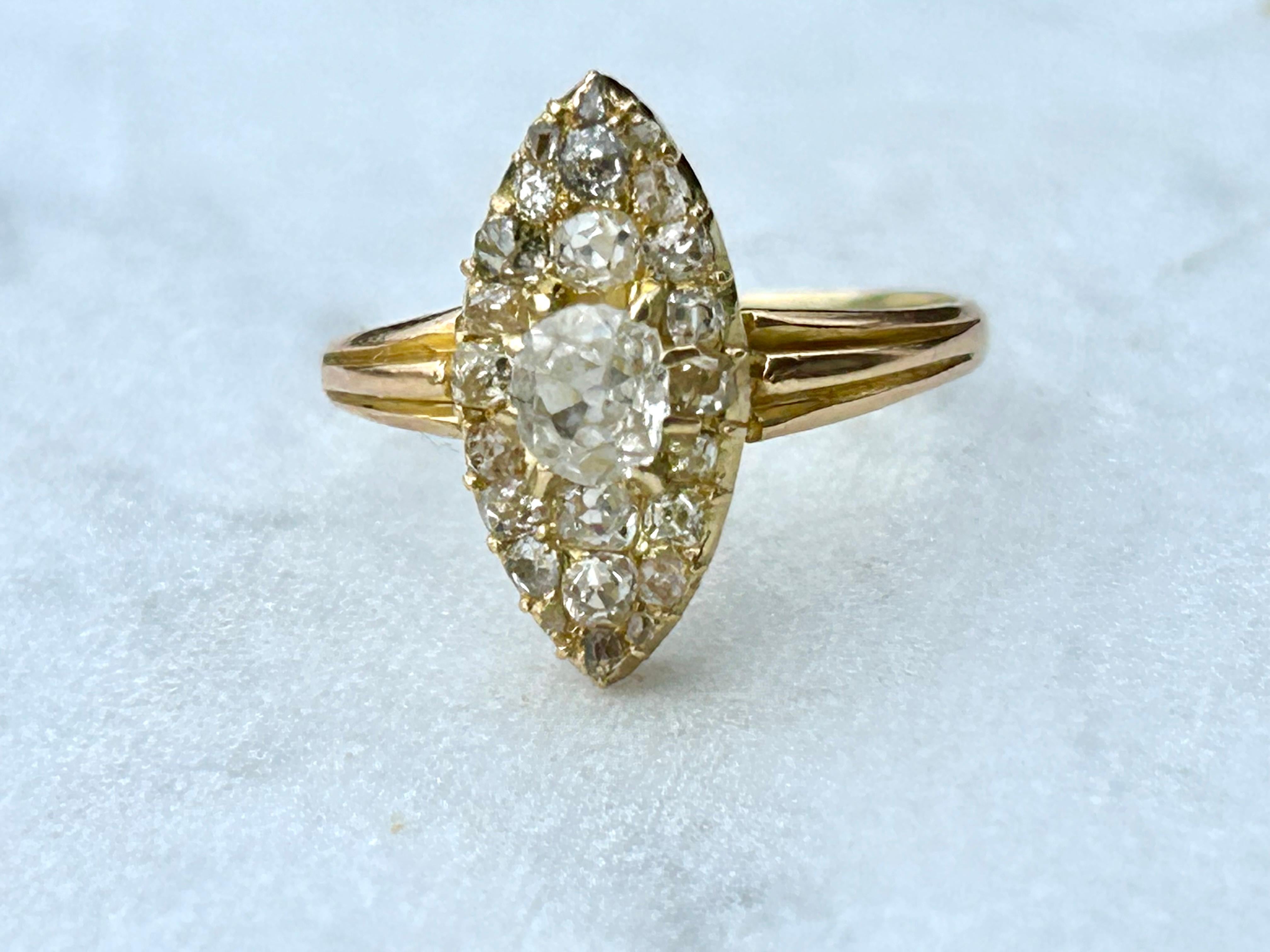 Circa 1880 Victorian 18k Gold Old Mine cut Diamond Navette. One of the prettiest navettes I've seen in awhile. This marquise shaped ring packs a punch! The sparkle on this piece is truly unreal.  It's jam-packed with old mine cuts and rose cuts