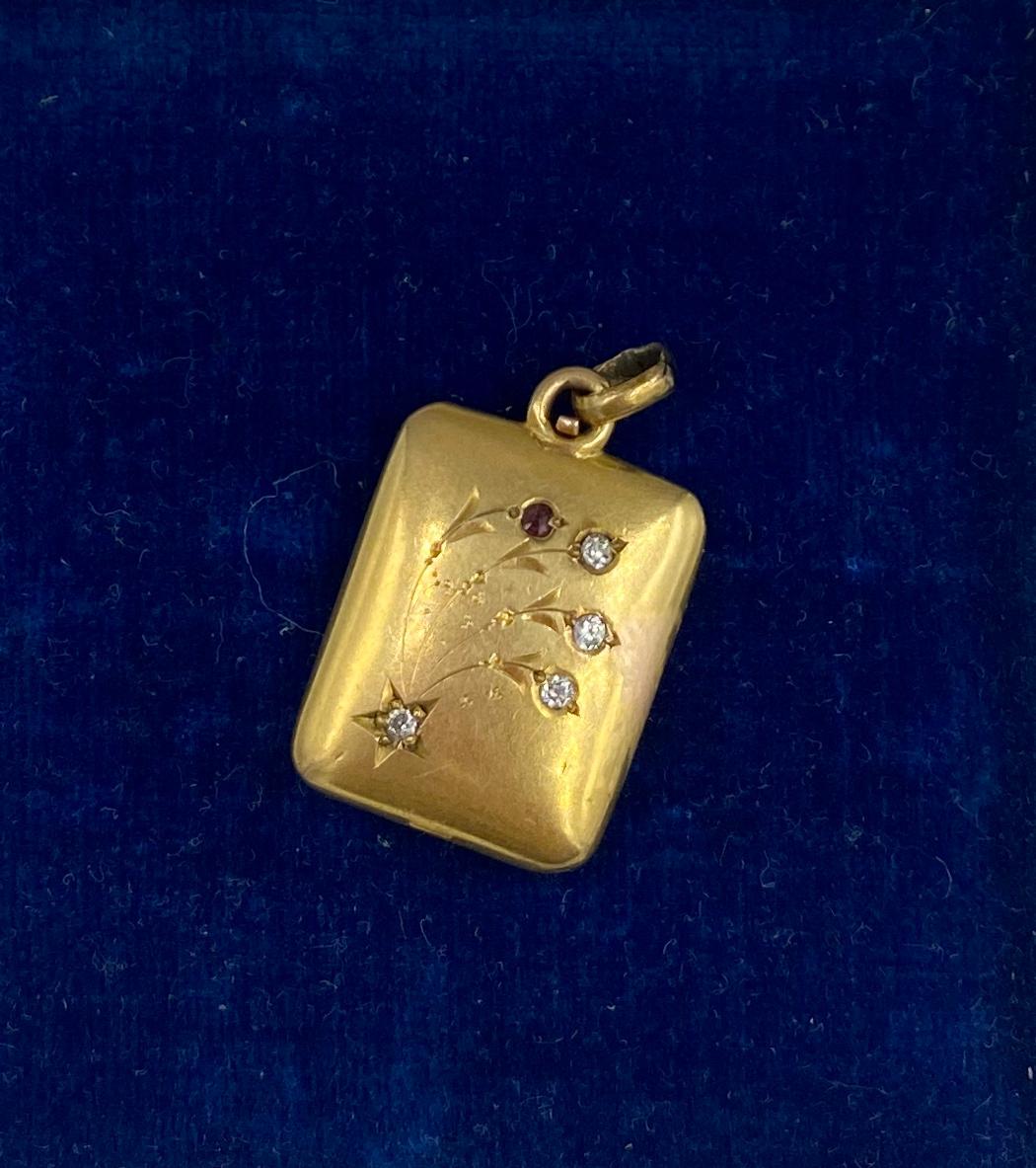 Antique Victorian Old Mine Diamond Ruby Locket Pendant 14 Karat Gold Star Flower In Good Condition In New York, NY