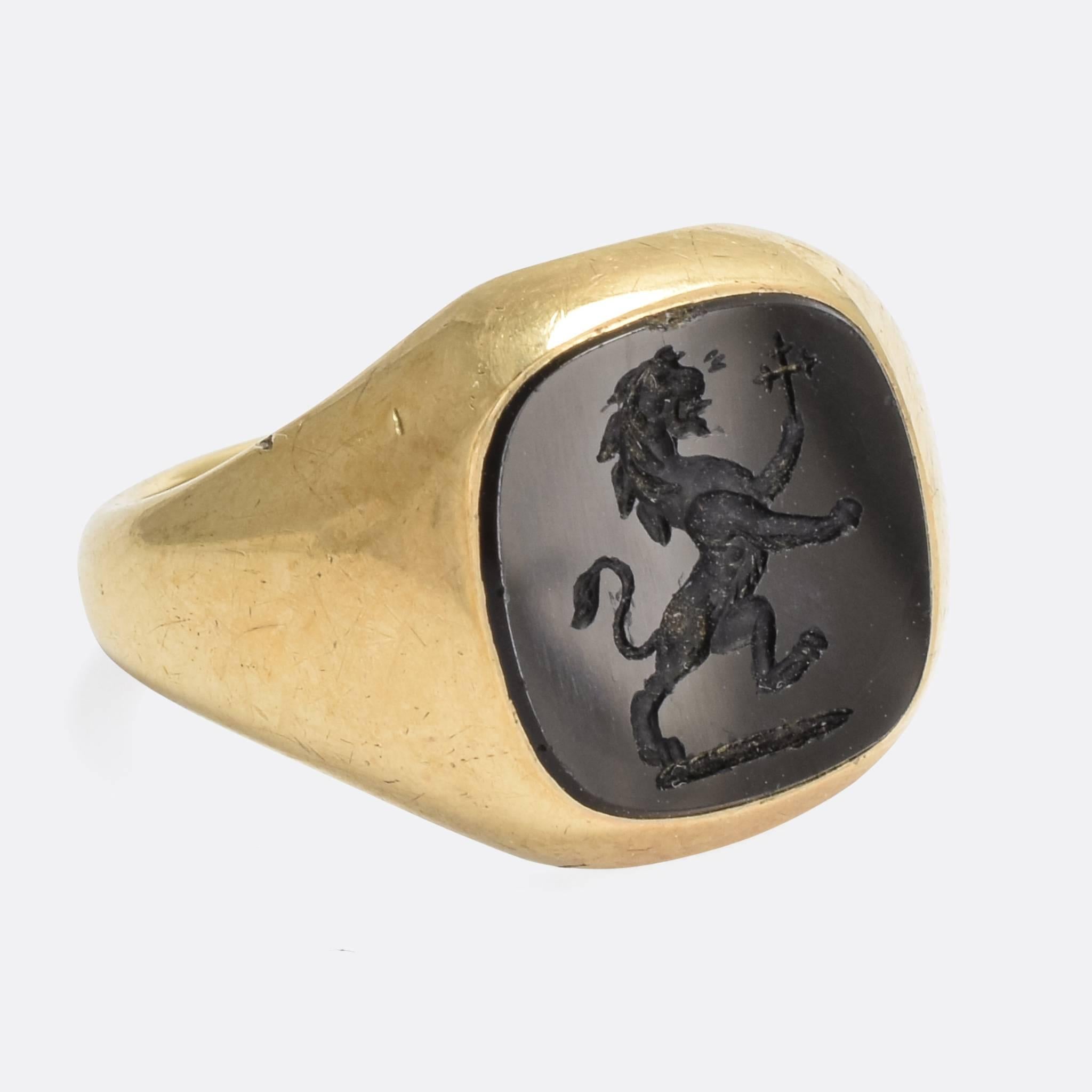 A cool antique signet ring by esteemed jewellers Charles Green & Son, who have been hand making fine quality gold and silver jewellery for over 180 years (they're still around today, as a sixth-generation family owned business).

The face has been