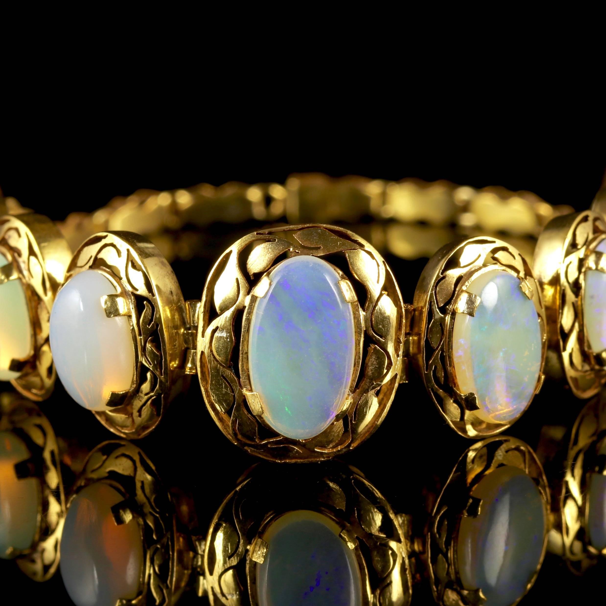 This beautiful Victorian Opal bracelet is, Circa 1900.

The Opal increase in size towards the centre of the bracelet.

The largest Opal is around 6ct with the smallest Opal at 2.5ct.

The total amount of Opal is approx. 25ct.

The lovely natural