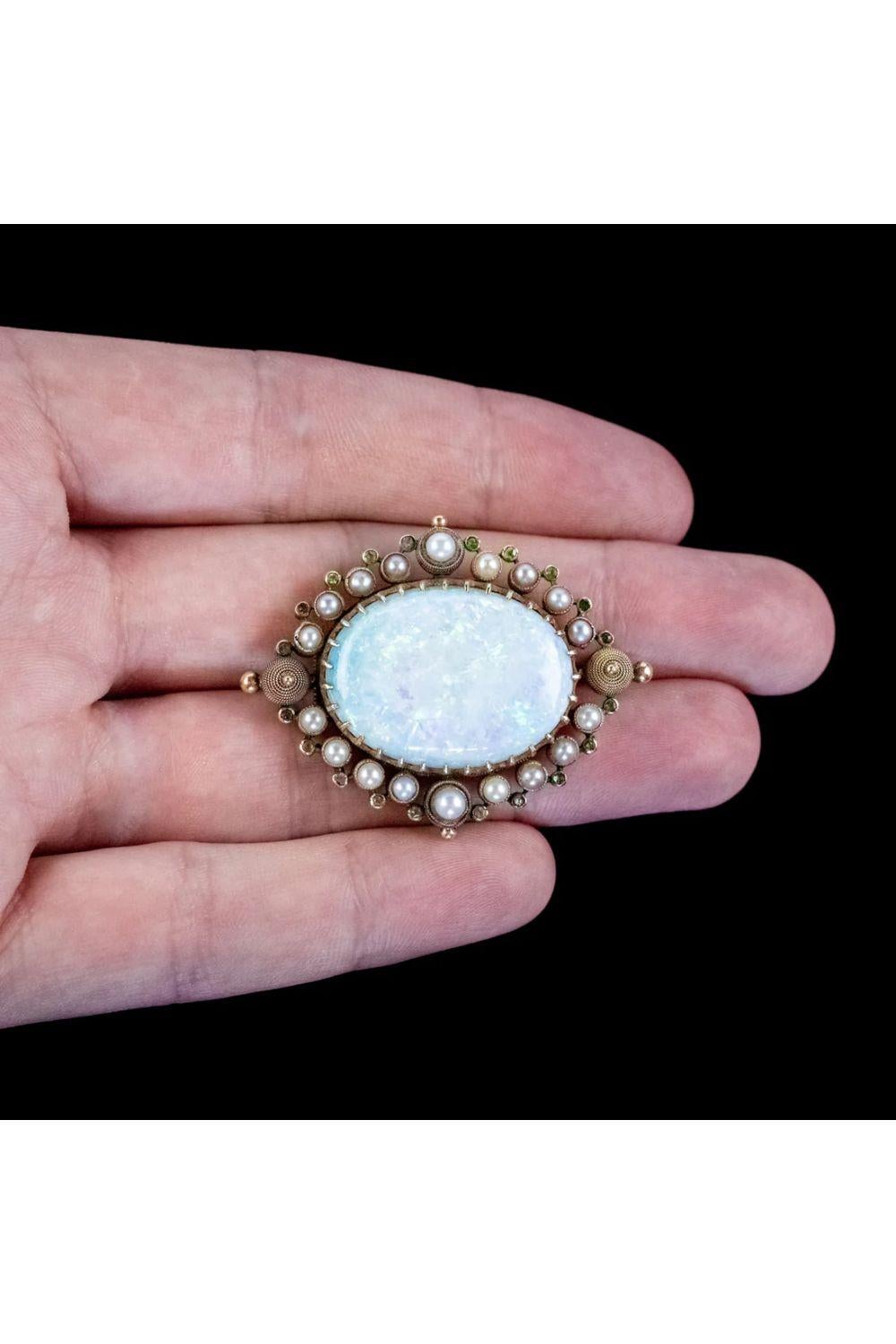 Antique Cushion Cut Antique Victorian Opal Garnet Pearl Brooch in 15 Carat Gold with 25 Carat Opal For Sale