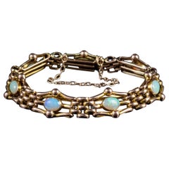 Antique Victorian Opal Gate Bracelet 9 Carat Yellow Gold, circa 1890