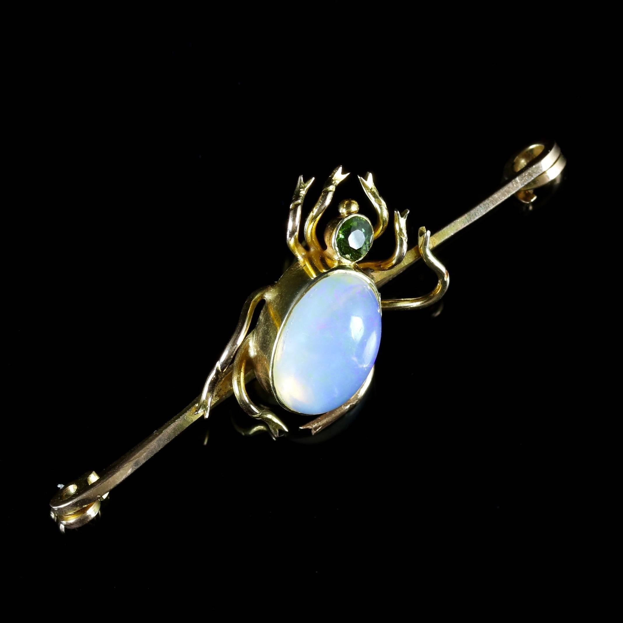 This elegant 9ct Gold Victorian Opal and Tourmaline Spider brooch is Circa 1900. 

Insect or spider jewellery today is highly collectable and was a symbol of good luck to the wearer during the Victorian Era.

The wonderful brooch is adorned with a