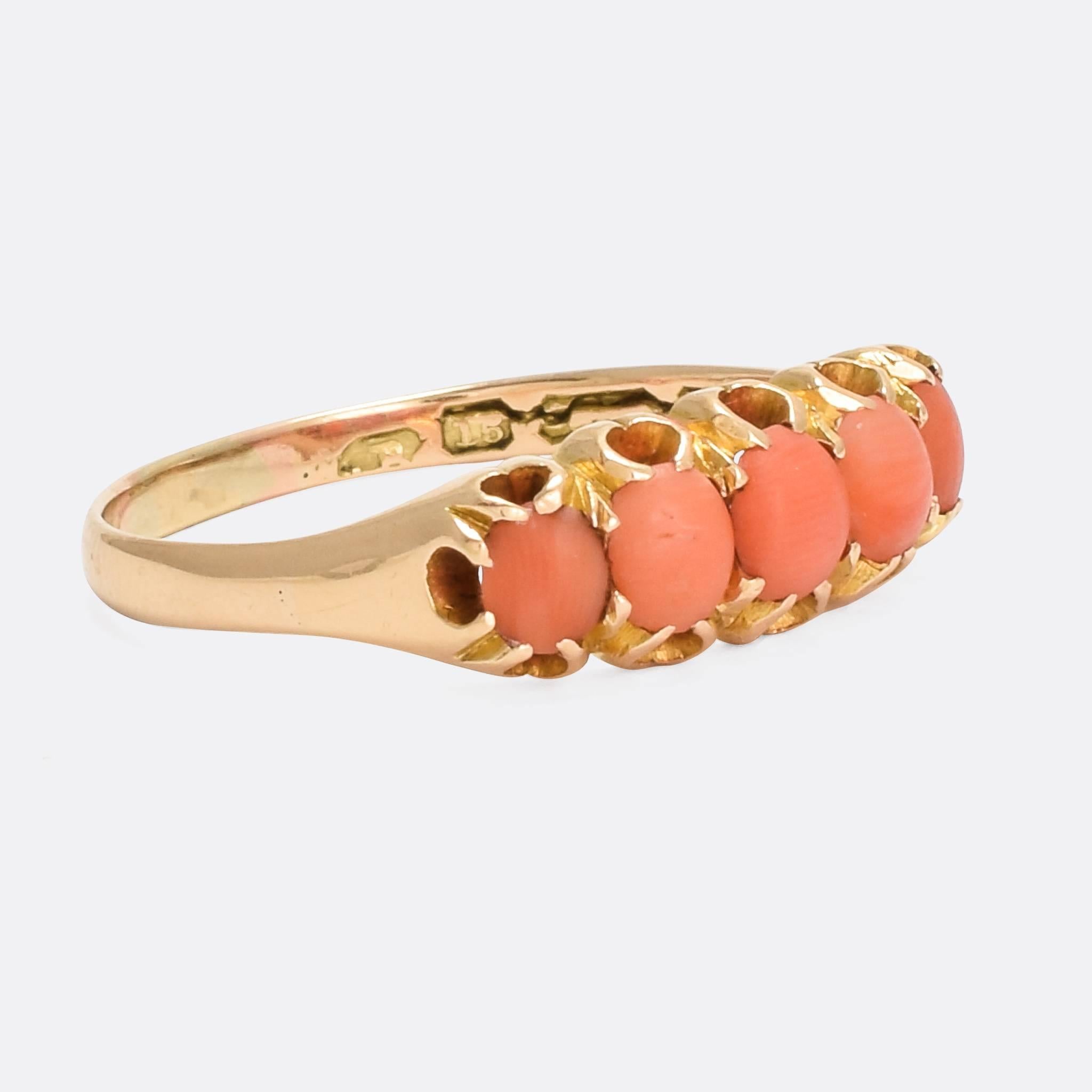 A striking antique orange coral 5-stone band. With elegant scalloped claw settings, it's modelled in 15 karat gold throughout and dates from the late Victorian period.

STONES 
Natural Coral

RING SIZE
10.25 US

MEASUREMENTS 
Head: 18.6 x