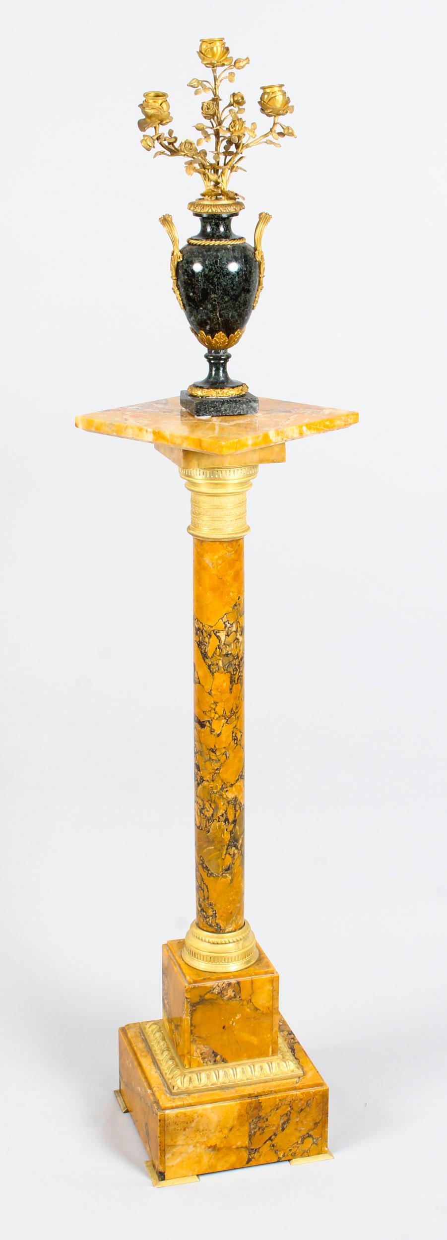 This is a magnificent antique Victorian ormolu mounted Italian sienna marble (also known as 'Giallo di Siena Unito') pedestal, late 19th century in date.

This sumptuous pedestal features an attractive square moulded platform top which is raised