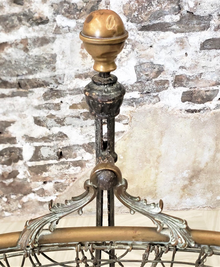 Antique Victorian Ornate Cast Iron and Brass Swinging Baby Cradle or