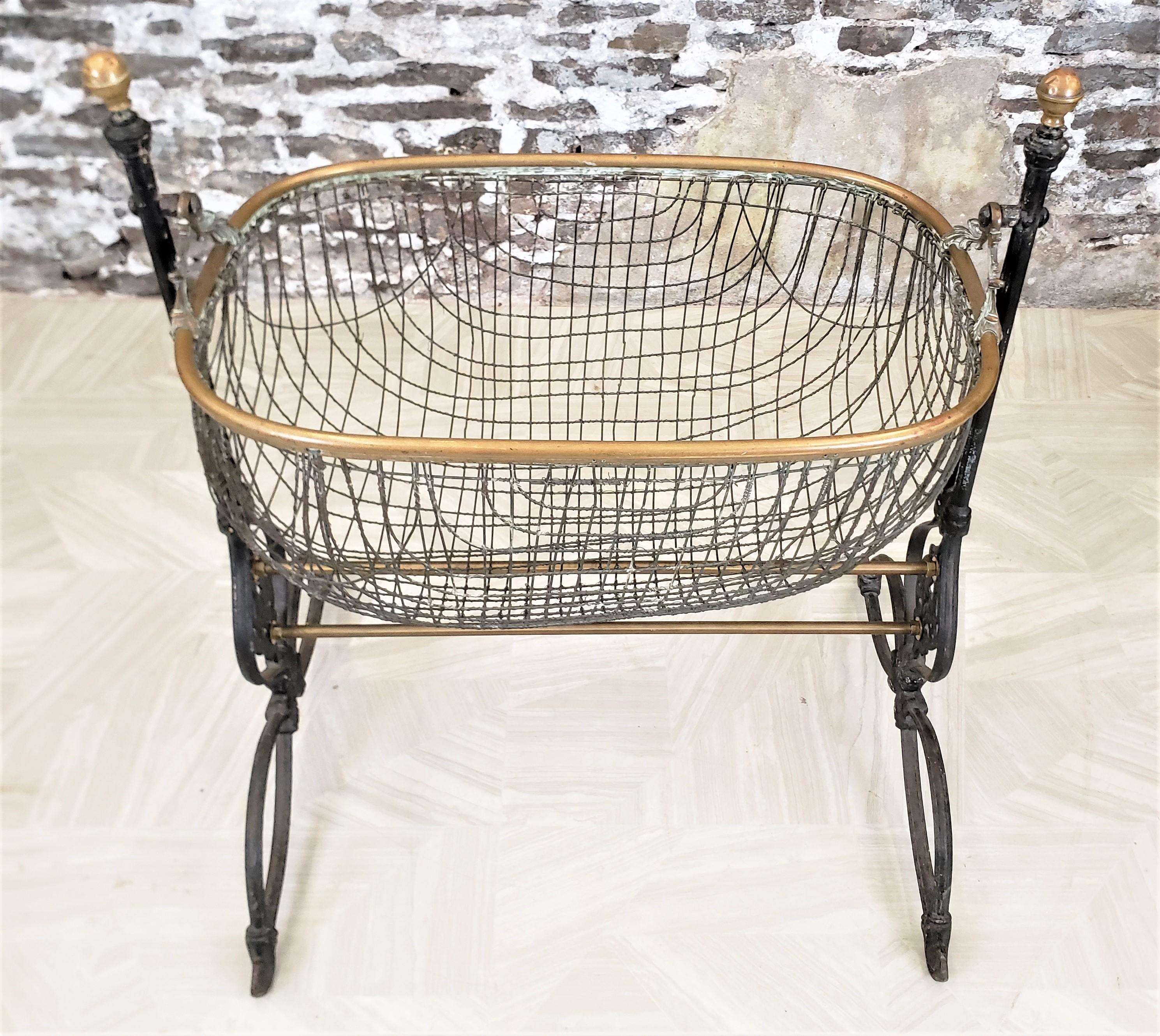 High Victorian Antique Victorian Ornate Cast Iron & Brass Swinging Baby Cradle or Plant Stand For Sale
