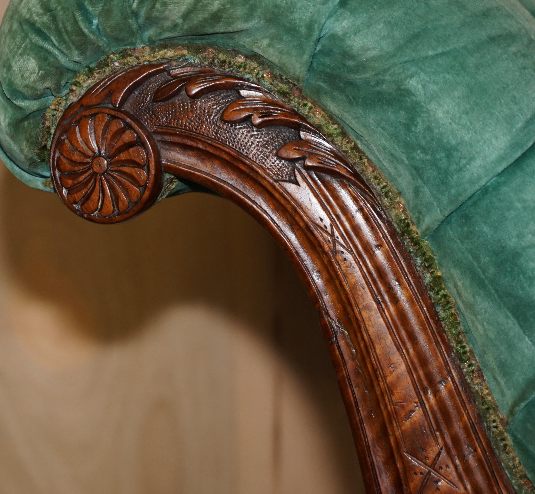 Hand-Crafted ANTIQUE VICTORIAN ORNATELY HAND CARVED WALNUT CHAiSE LOUNGE PORCELAIN CASTORS For Sale