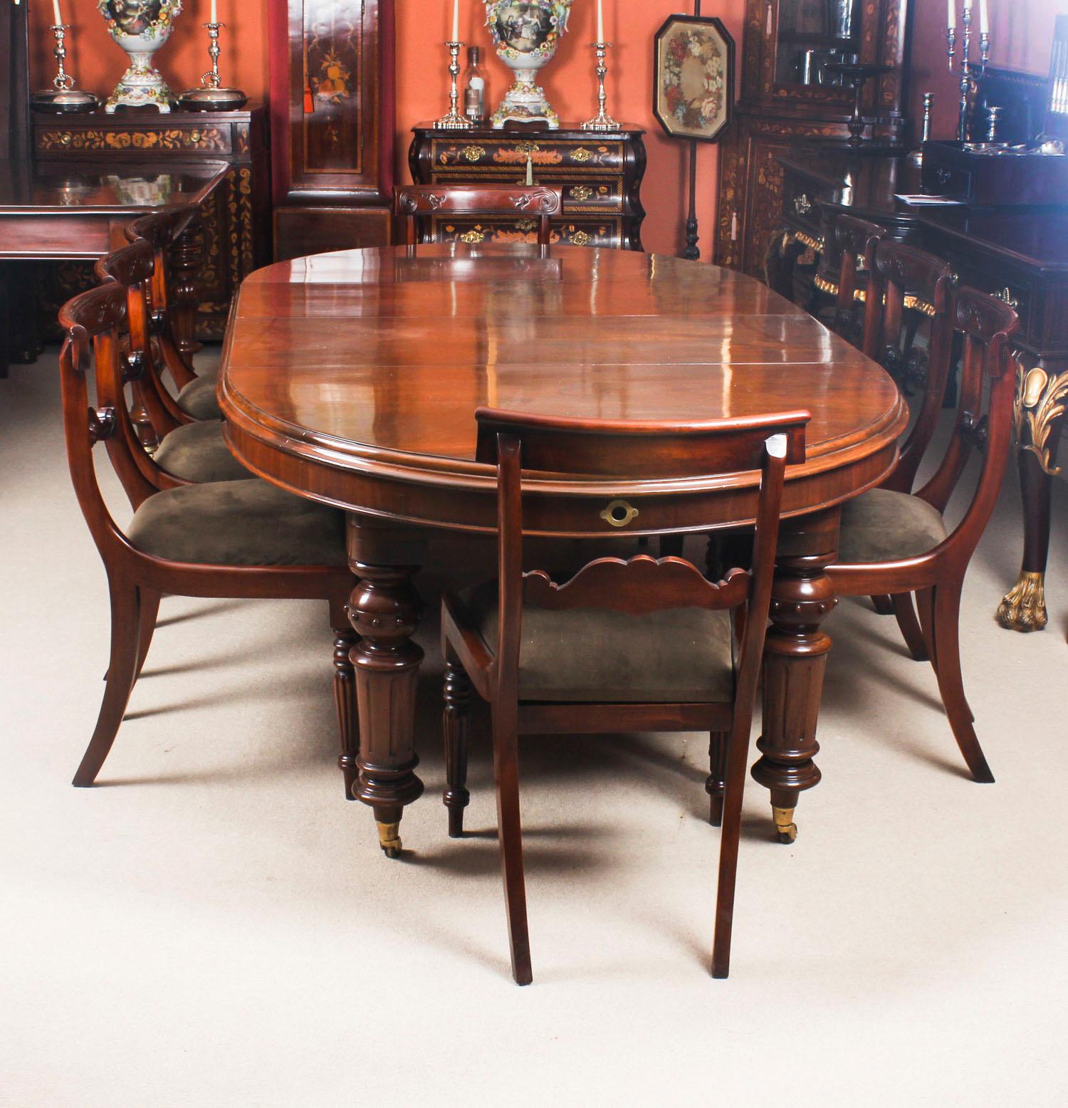 This is a fabulous dining set comprising an antique Victorian mahogany oval extending dining table, circa 1860 in date with a set of eight bespoke Regency style mahogany bar back dining chairs.

The table has two original leaves and has been
