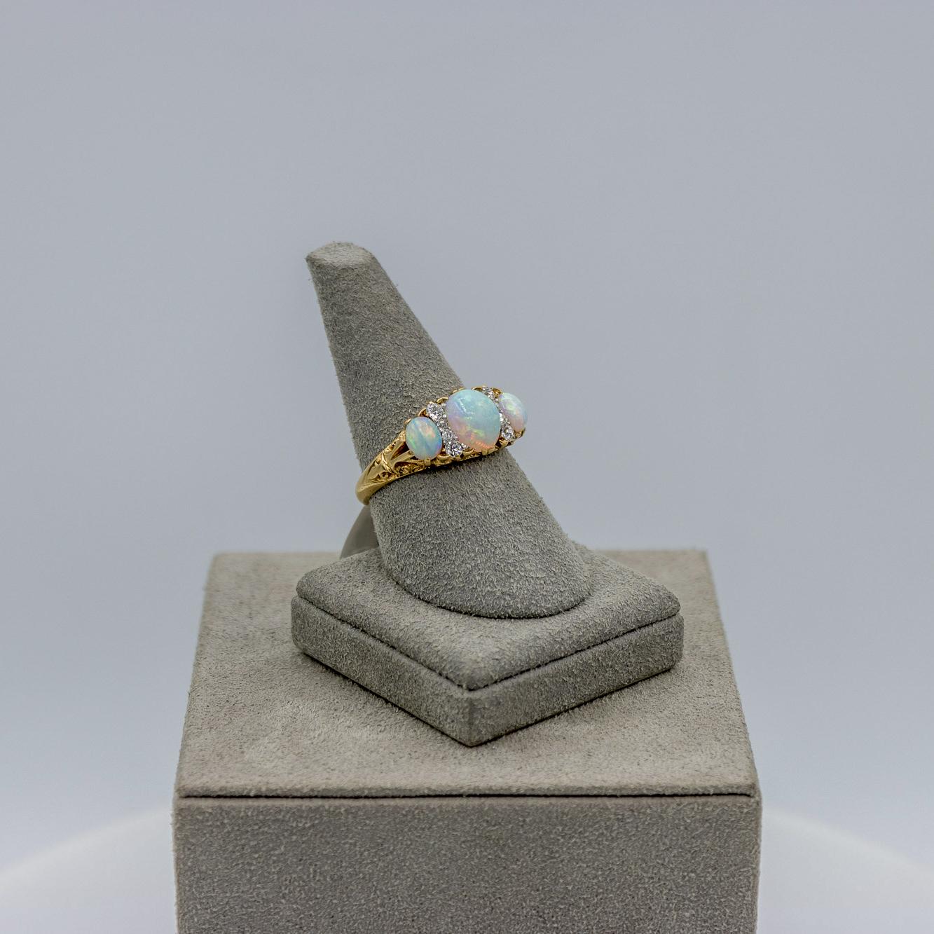 Antique Victorian Oval Opal and Diamond Three-Stone Fashion Ring In Good Condition In New York, NY