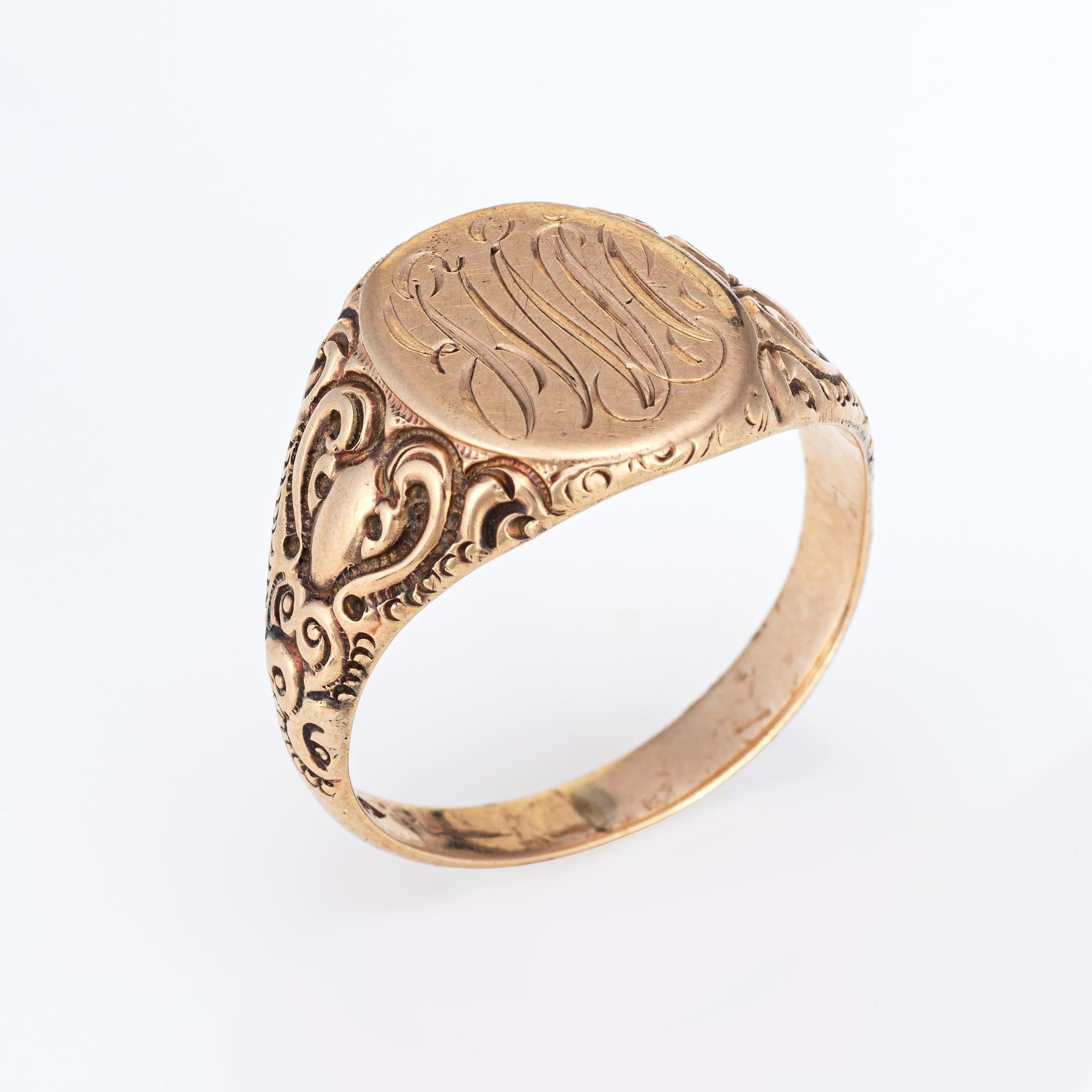 Lovely antique Victorian signet ring (circa 1880s to 1900s), crafted in 10 karat rose gold. 

From what we can decipher, the center mount is engraved with the initials 