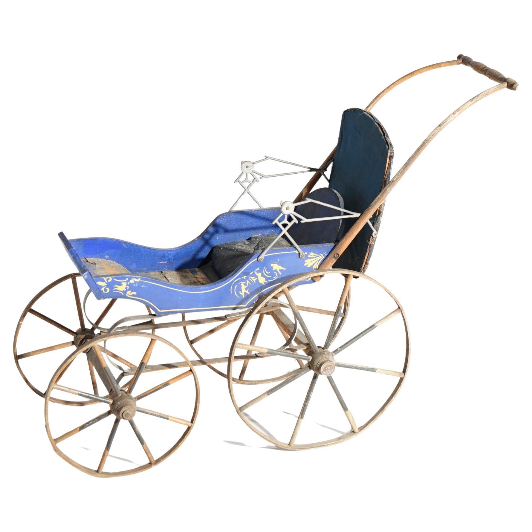An antique Victorian doll buggy offers retractable canopy, shaped and stenciled body and spoked wheels, 19th century

Measures- 27.25''H x 15.5''W x 36''D.

*Ask about DISCOUNTED DELIVERY rates within 1,500 miles of NY*