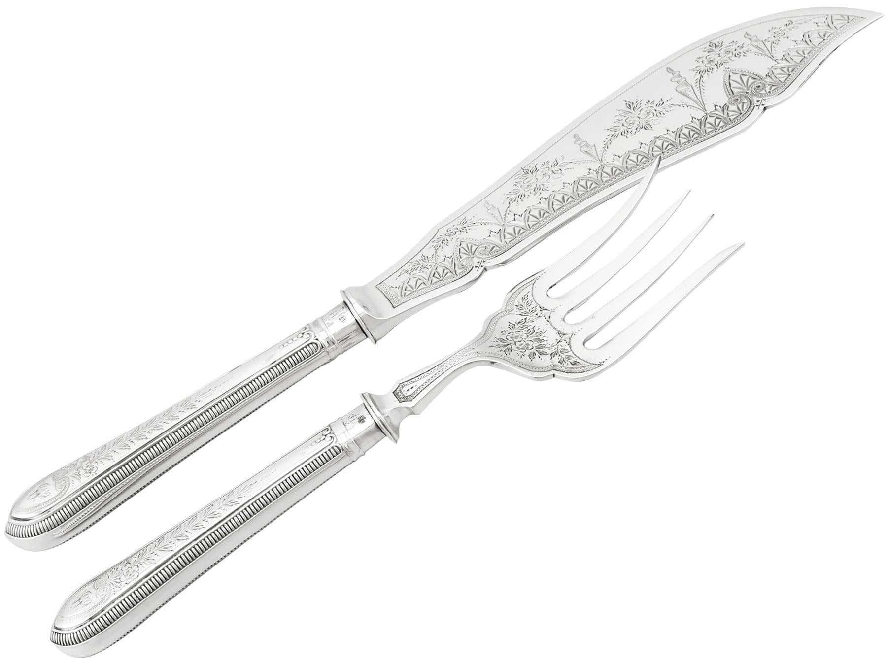 An exceptional, fine and impressive pair of antique Victorian English sterling silver fish servers - boxed; an addition to our silver flatware collection

This exceptional pair of antique Victorian boxed silver fish servers, in sterling standard,