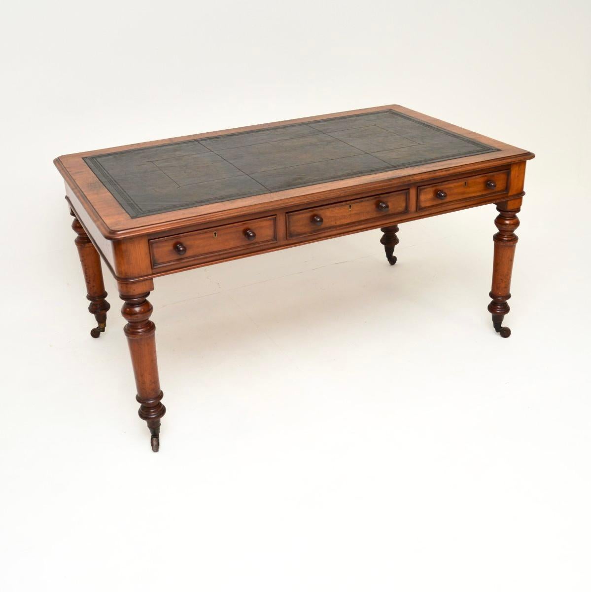 A large and very impressive antique Victorian partners desk / writing table. This was made in England, it dates from around 1830-1850.

It is of superb quality and is a great size, this is finished identically back and front, with three drawers on