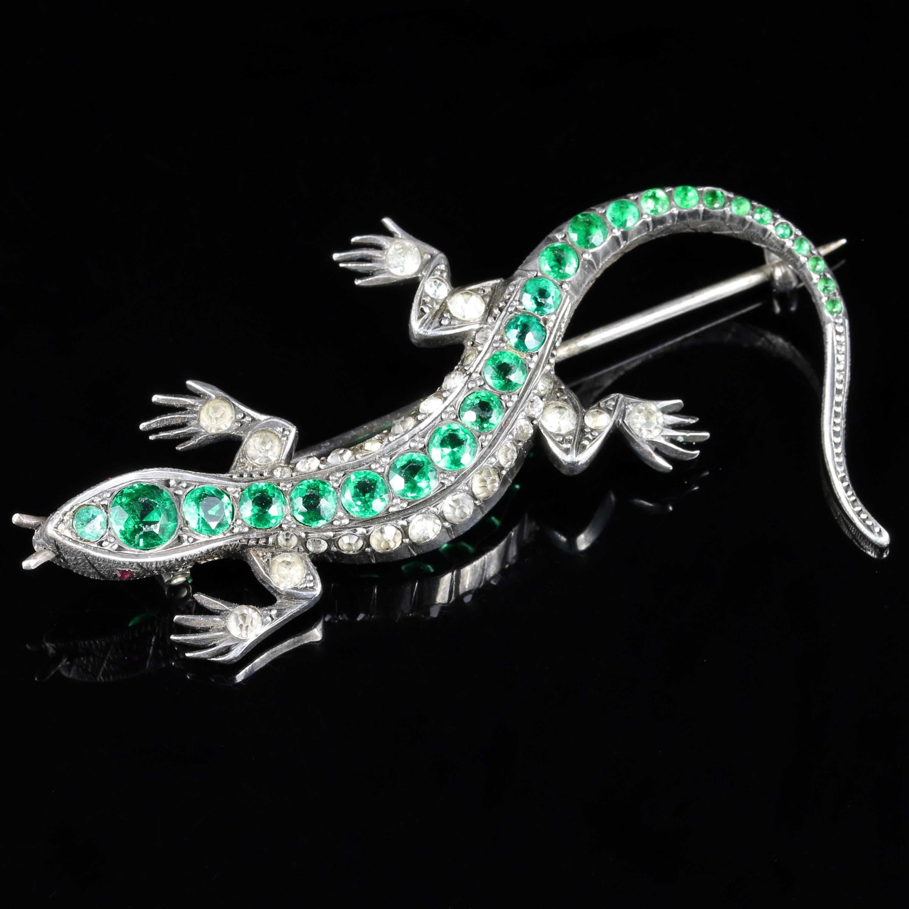 For more details please click continue reading down below...

This genuine Victorian lizard brooch is adorned with sparkling old cut Paste Stones all round. Circa 1890

The lizards body is decorated with beautiful Green and White Paste stones, with