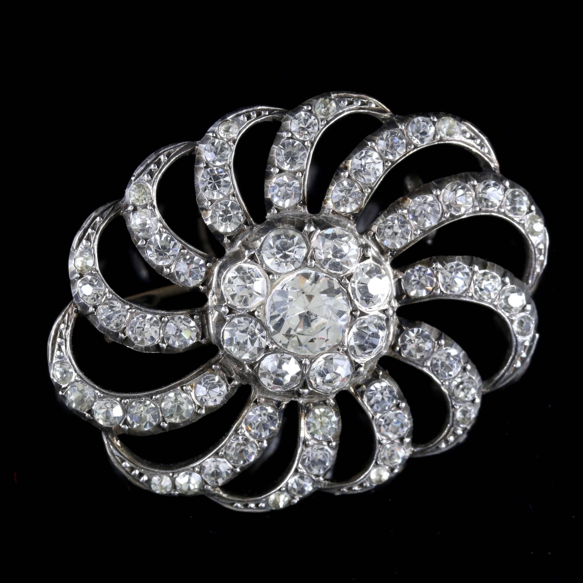 This fabulous Victorian Paste Stone brooch is set in Silver, Circa 1900.

The brooch is adorned in sparkling Paste Stones that sparkle just like Diamonds, they graduate in size all round the brooch. it is truly beautiful.

Paste is a heavy, very