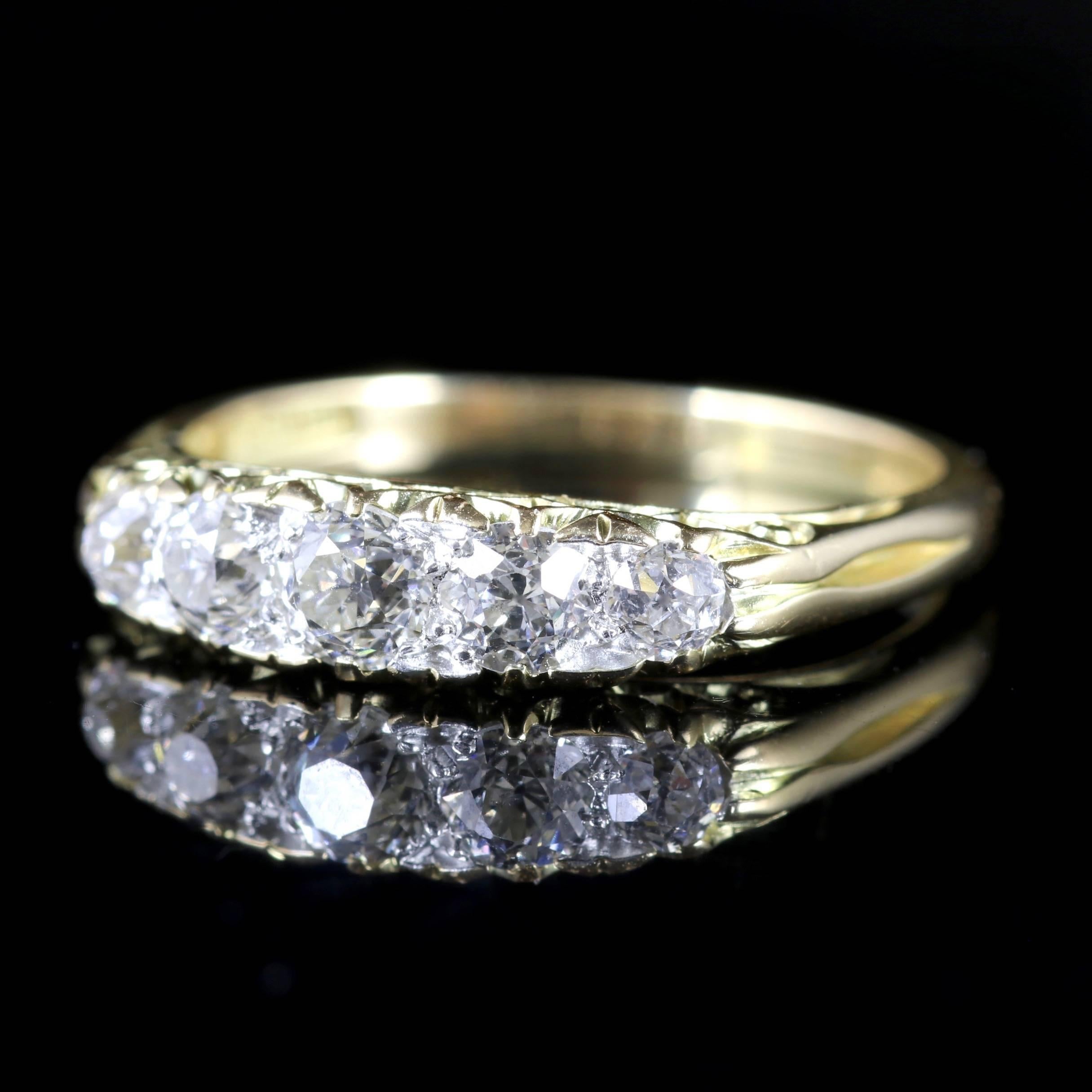 This fabulous antique Victorian Pave set Diamond ring is stunning, Circa 1880.

Five beautiful old cut Diamonds sit beautifully into the 18ct Yellow Gold gallery.

Set with approx. 1ct of Diamonds in total.

The Diamonds are a superb cut, colour and