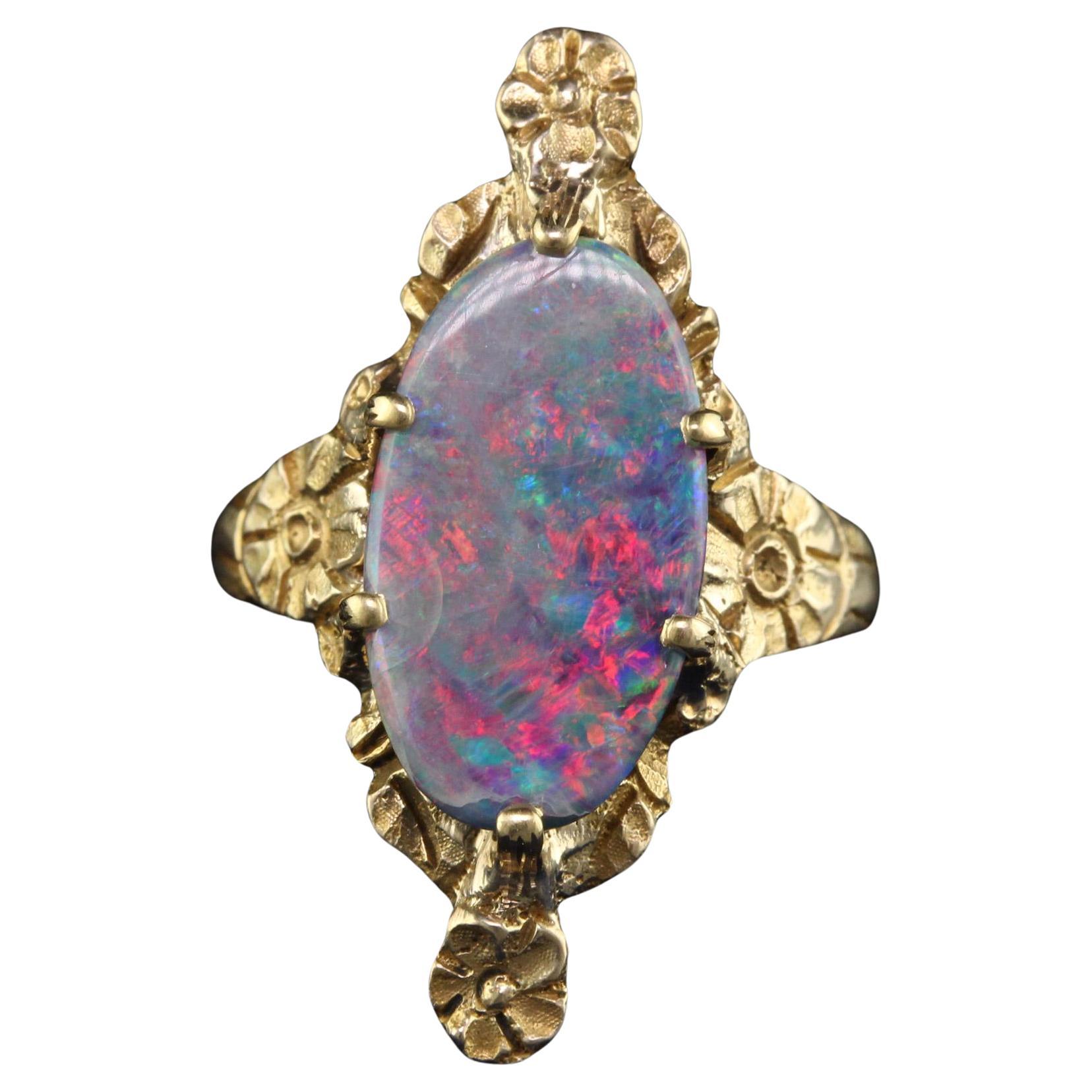 Antique Victorian Peacock 10K Yellow Gold Boulder Opal Floral Ring For Sale
