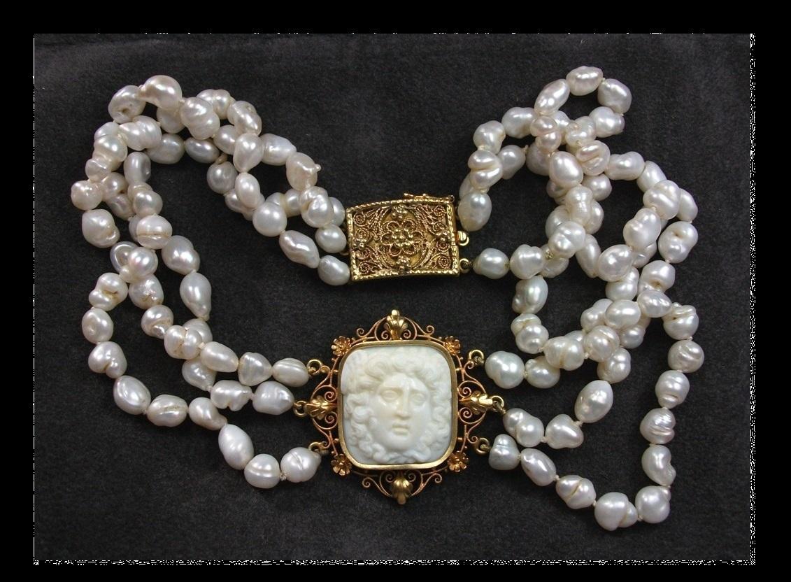 Excellent Quality cameo necklace depicting the Gorgon Medusa. Even if this subject was very popular in the Victorian era, finding a front face one is very rare and rarest finding one so finely carved. This is even rarer because it is carved on the