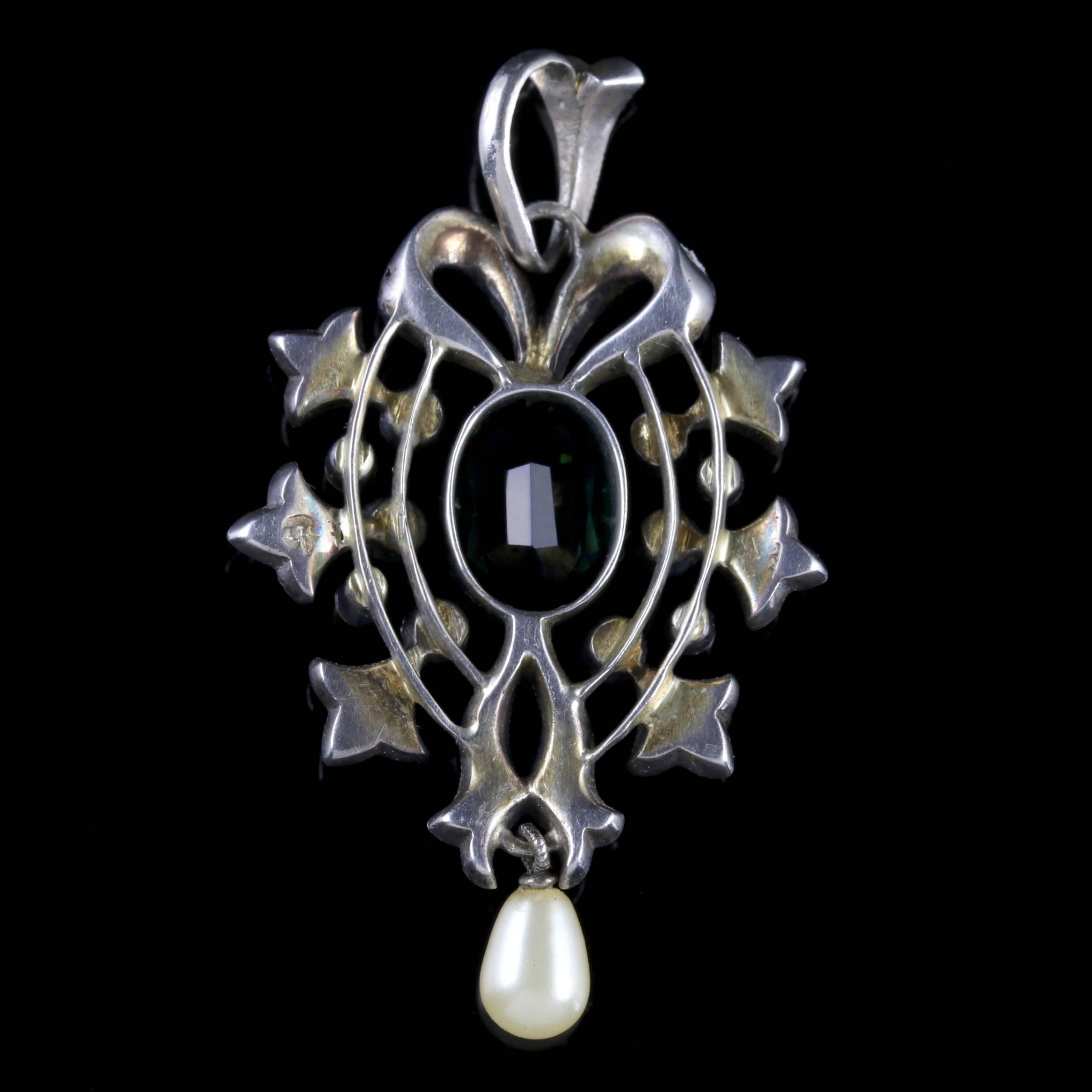 To read more please click continue reading below-

This fabulous antique Paste stone and Pearl pendant is Victorian Circa 1900.

The wonderful pendant is decorated with sparkling white Paste stones with a beautiful green Paste in the centre which