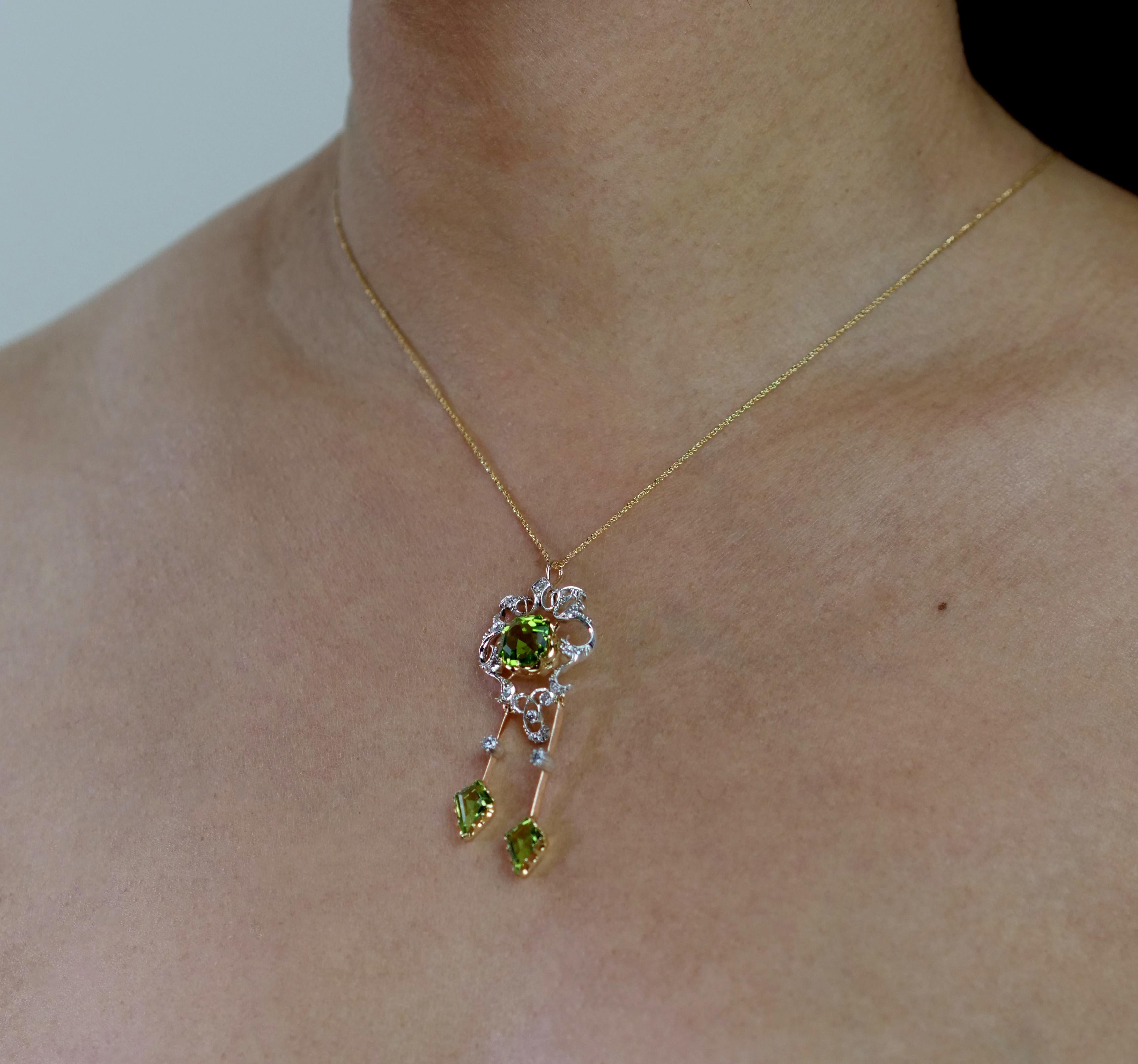 Antique, Victorian  Peridot and diamond pendant/brooch set in 18K yellow gold and silver, with detachable brooch fitting.
1 x Cut corner rectangular Peridot, approximate weight 3.3 carats
19 x Old European and Rose cut diamonds, approximate total