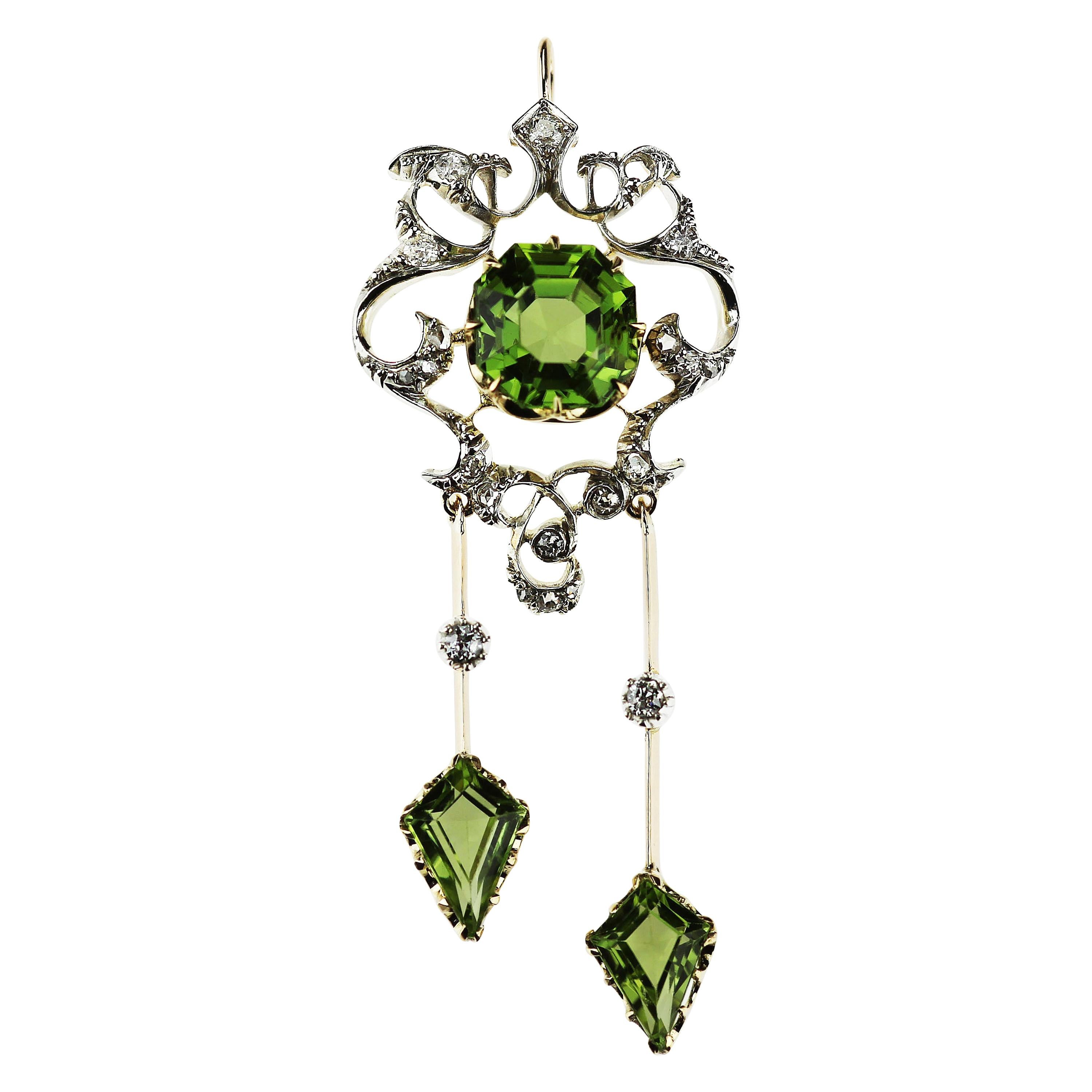 Antique Victorian Peridot and Diamond Pendant Brooch in 18 Karat Gold and Silver