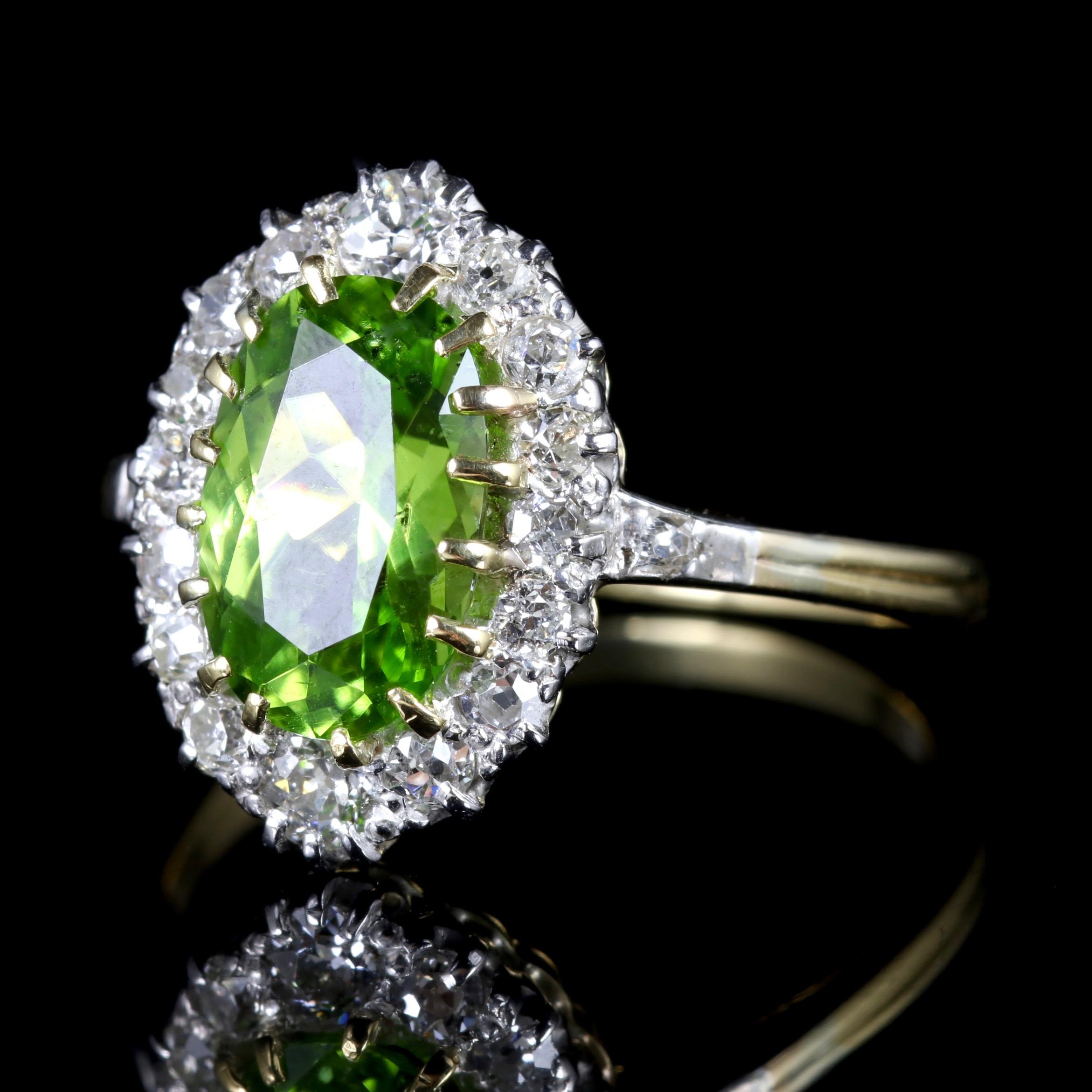 This fabulous Victorian 18ct Yellow Gold ring is Circa 1900.

The ring boasts a 2.85ct Peridot on the centre, surrounded by a halo of sparkling Diamonds.

The Peridot is a stone of lightness and beauty and was believed to be a stone of springtime by
