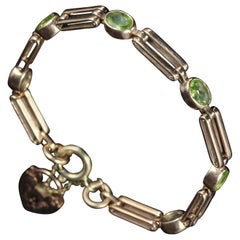 Antique Victorian Peridot Gate Bracelet 9 Carat Rose Gold, circa 1890