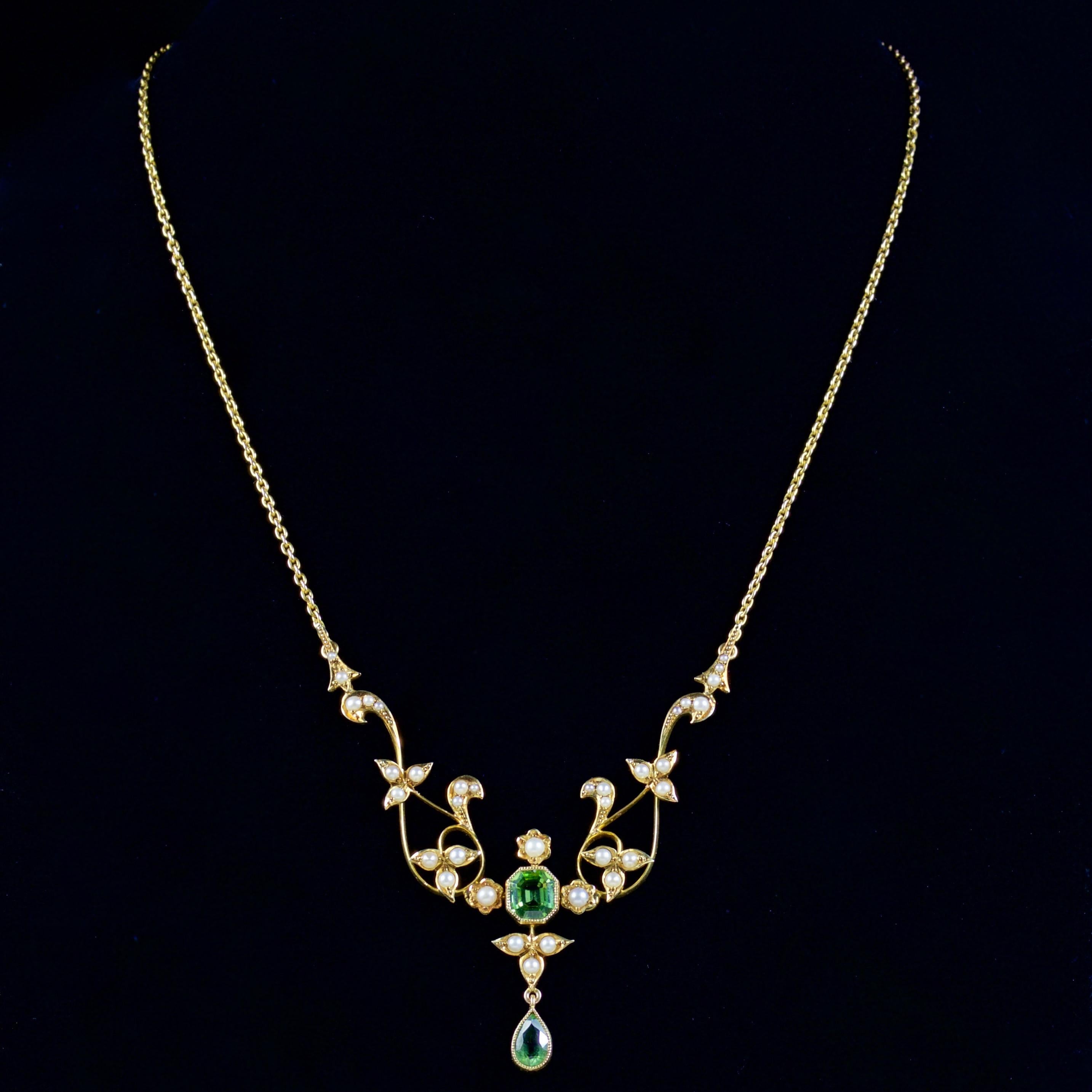 This elegant antique Victorian Peridot and Pearl necklace is Circa 1900.

The superb necklace boasts a beautiful combination of Pearls and Peridots in a floral 15ct Gold gallery.

The largest Peridot is 1ct which leads to the dropper which is