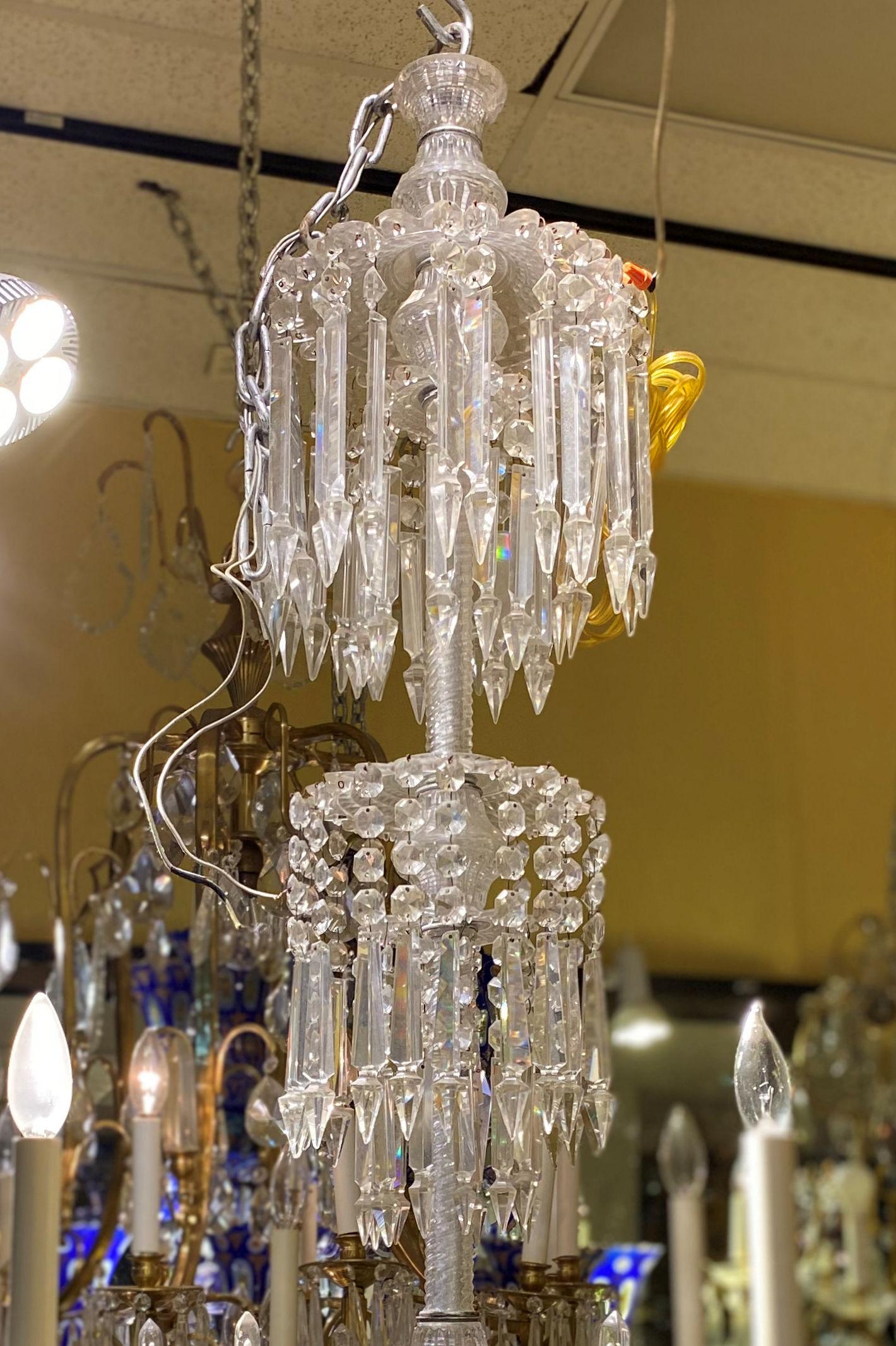 Victorian period frosted glass and cut crystal chandelier of the finest quality with extensive faceted crystal pendants. Provenance: Nesle, New York.