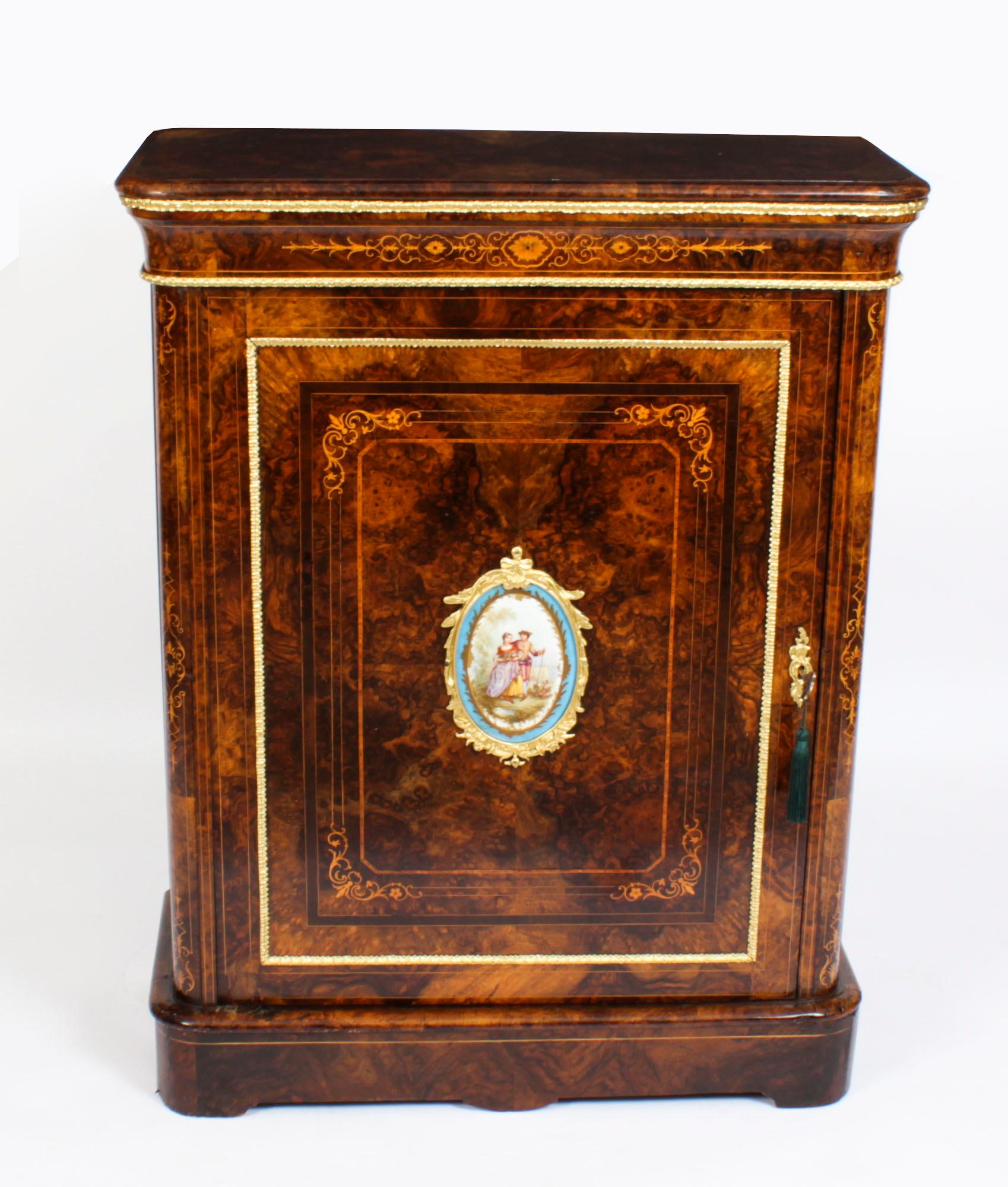 This stunning antique Victorian cabinet is a true rarity. It has been accomplished in burr walnut, an exotic and valuable veneer, has beautiful inlaid decoration and ormolu mounts, and is Circa 1860 in date.
 
Adding to its truly unique character