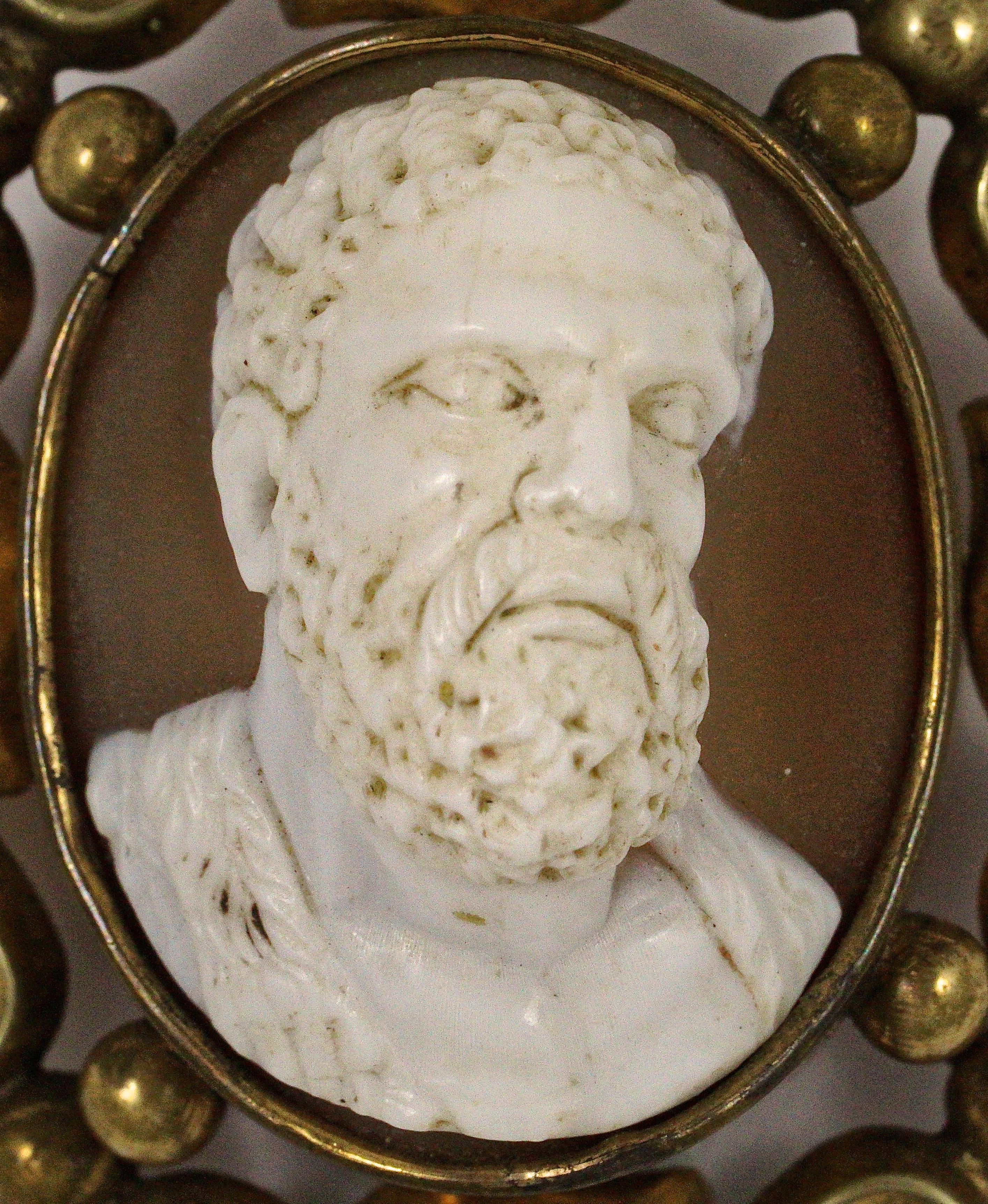 Fine quality and detailed Victorian carved shell cameo brooch of a bearded man, probably the Greek god Zeus, in a lovely fancy scroll pinchbeck setting. Measuring 5.3cm / 2.08 inches by 5.7cm / 2.24 inches. The 