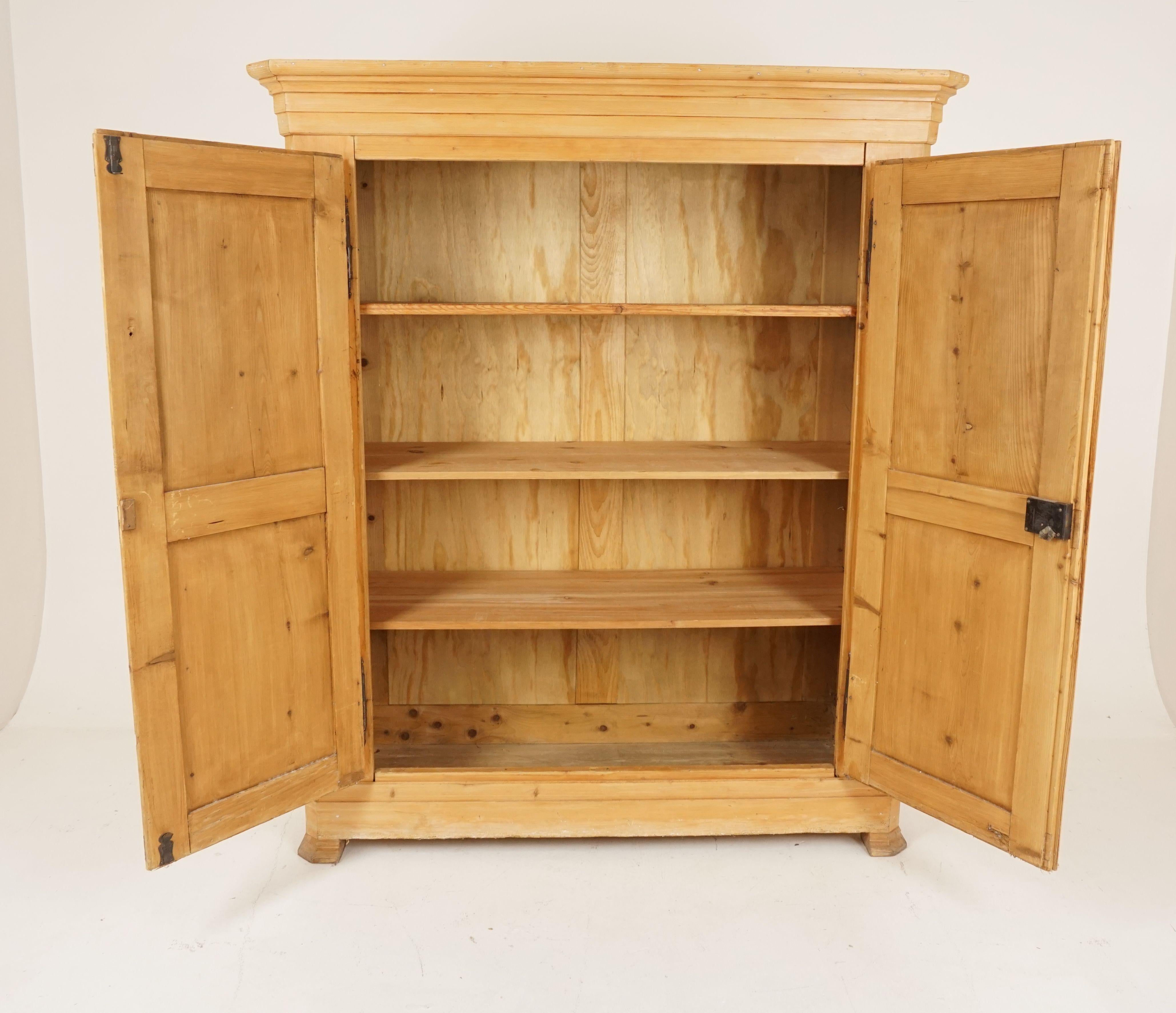 Antique Victorian pine armoire, wardobe, closet, France 1880, B2475 

France, 1880
Solid pine
Large cornice on top with canted corner
Pair of moulded paved doors
Original lock and key
Opens to reveal a pair of original full length shelves and