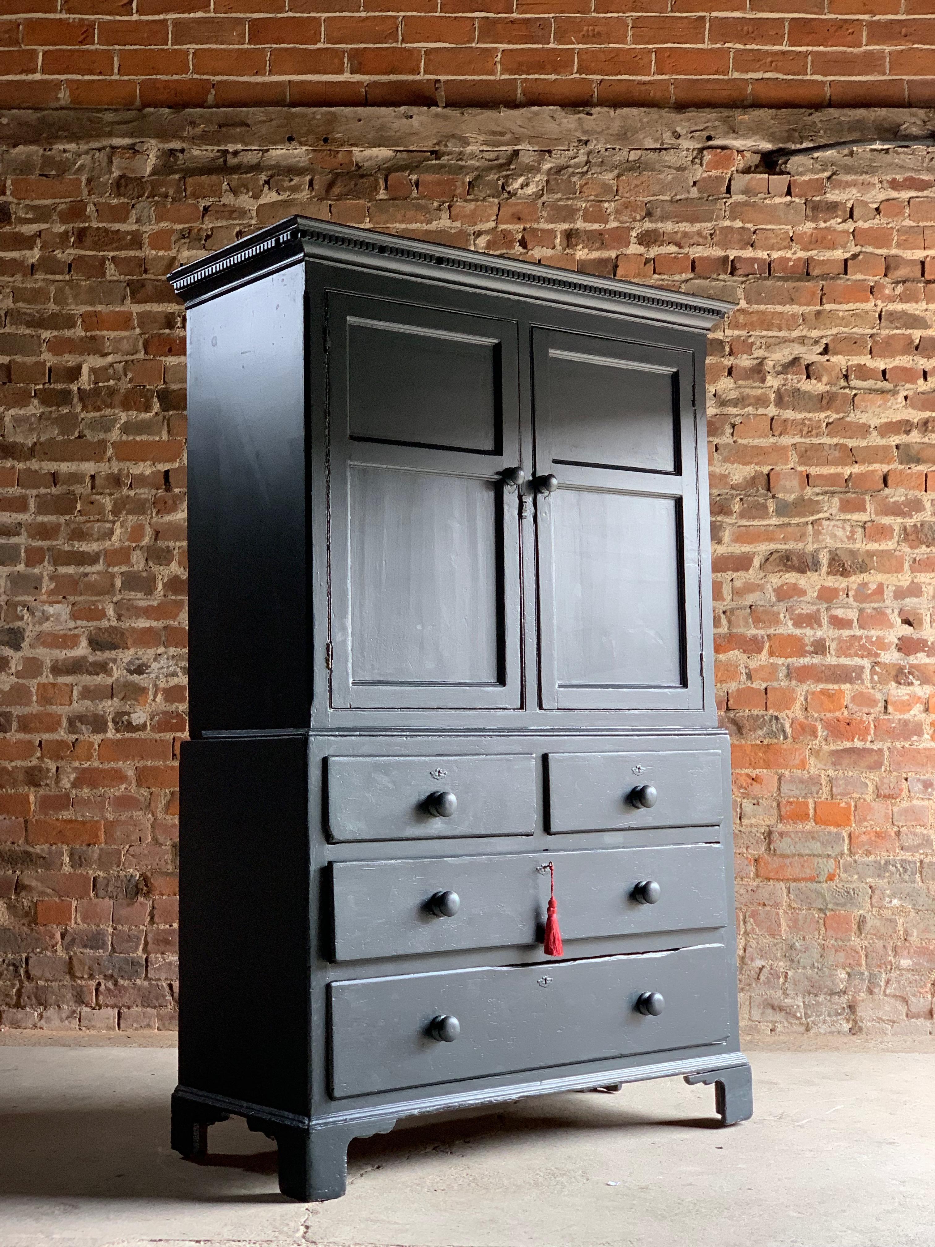Antique 19th century painted pine housekeepers cupboard, circa 1880, the moulded overhanging cornice above two panelled doors, enclosing various shelves within,
over chest with two drawers and two long drawers , all raised on bracket feet, comes