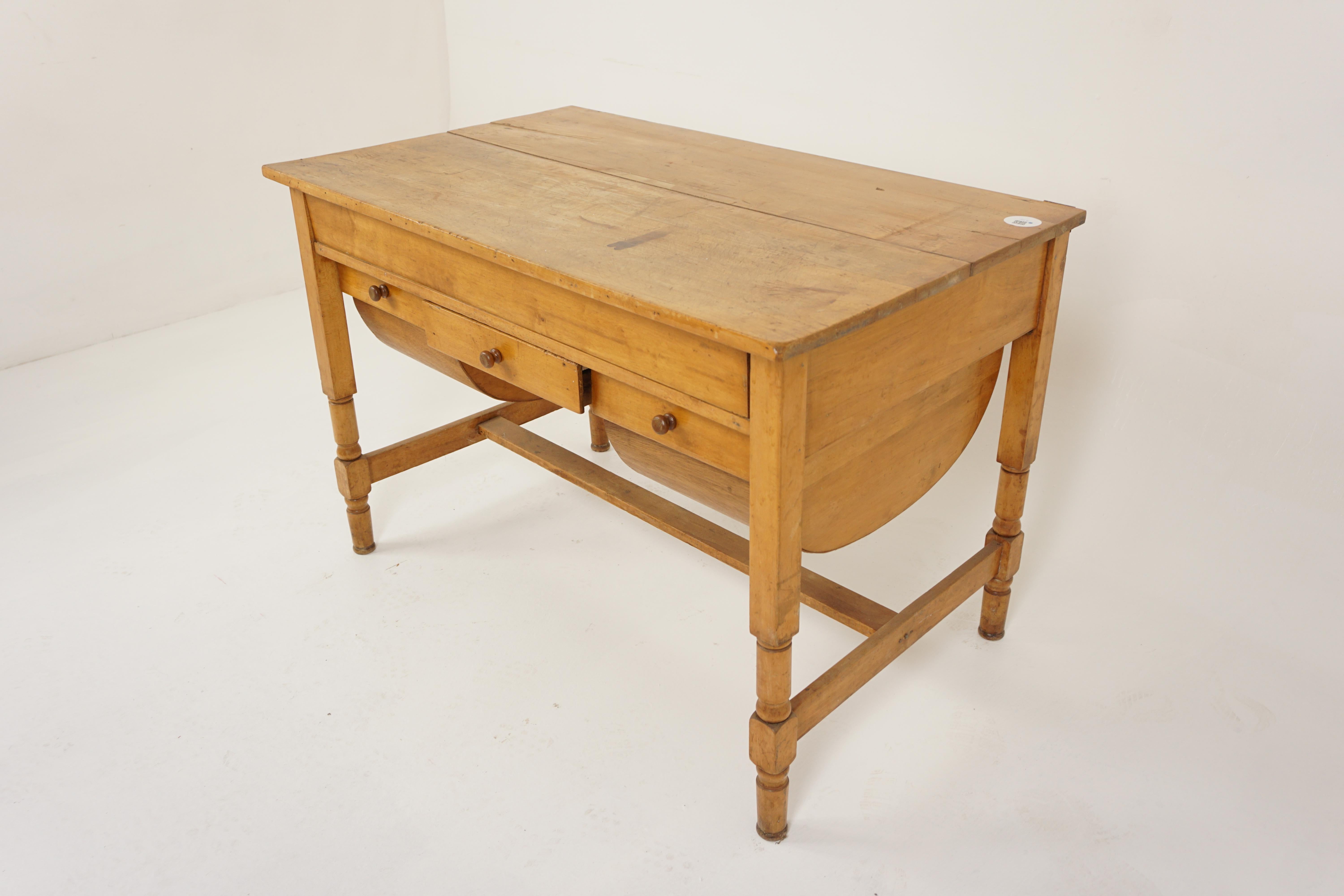 Ant. Victorian Pine Kitchen Lift Table Baking Table, Scotland 1890, H938

Scotland 1890
Solid Pine
Original Finish 
Rectangular top lifts up and is supported on one end by a wedge
Cutlery drawer in the center
Flower bin on the right and left