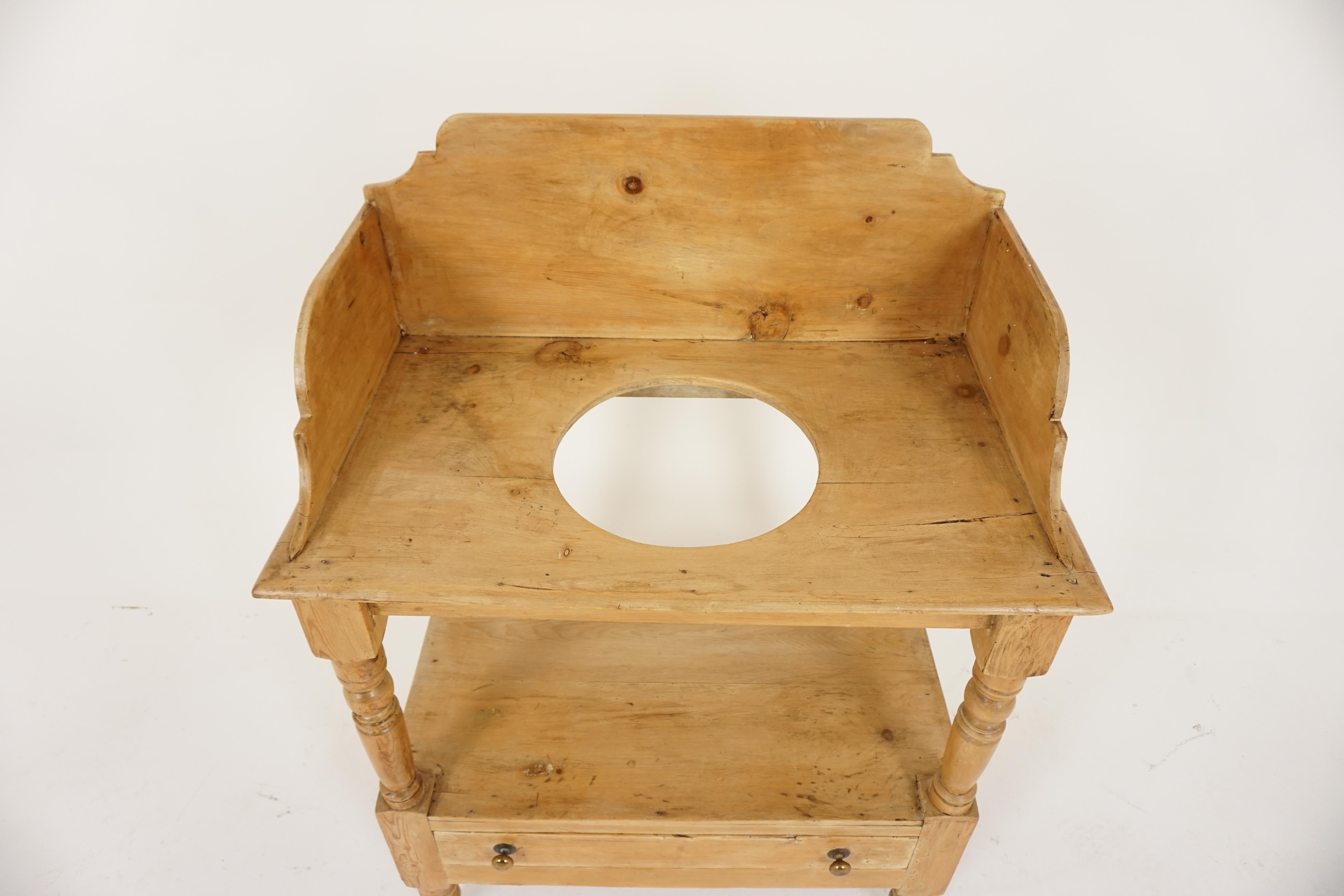 Antique Victorian pine washstand, table, Scotland 1880, B2063

Scotland, 1880
Solid pine construction
Wax finish
High splash-back gallery
Shaped back and sides
Moulded edge to the top
Below is a shelf with a long dovetailed drawer
Original