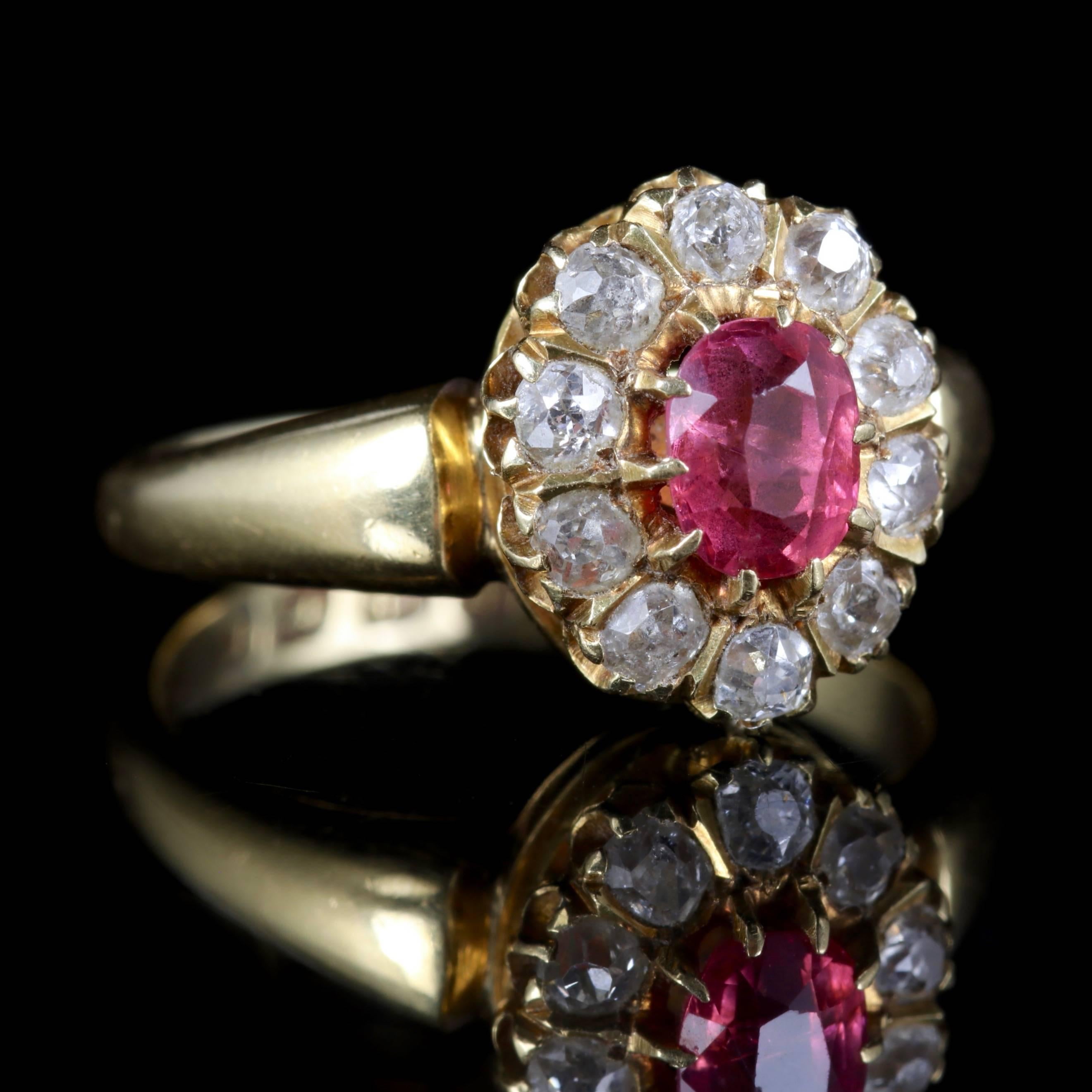 This fabulous Victorian 18ct Yellow Gold ring is dated Birmingham 1891. 

A 0.80ct Pink Sapphire is set in the centre which is surrounded by sparkling cushion cut Diamonds.

Pink Sapphire is a stone of passion that brings joyful play to any